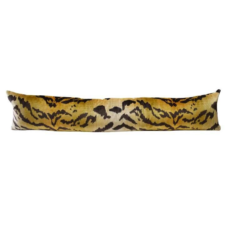 One animal motif tiger print long lumbar or body pillow. Multiple available. The front features gorgeous thick velvet animalia print. Back features a crisp cream. Down-filled. Knife edge with zipper. In the style of Scalamandre's Le tiger