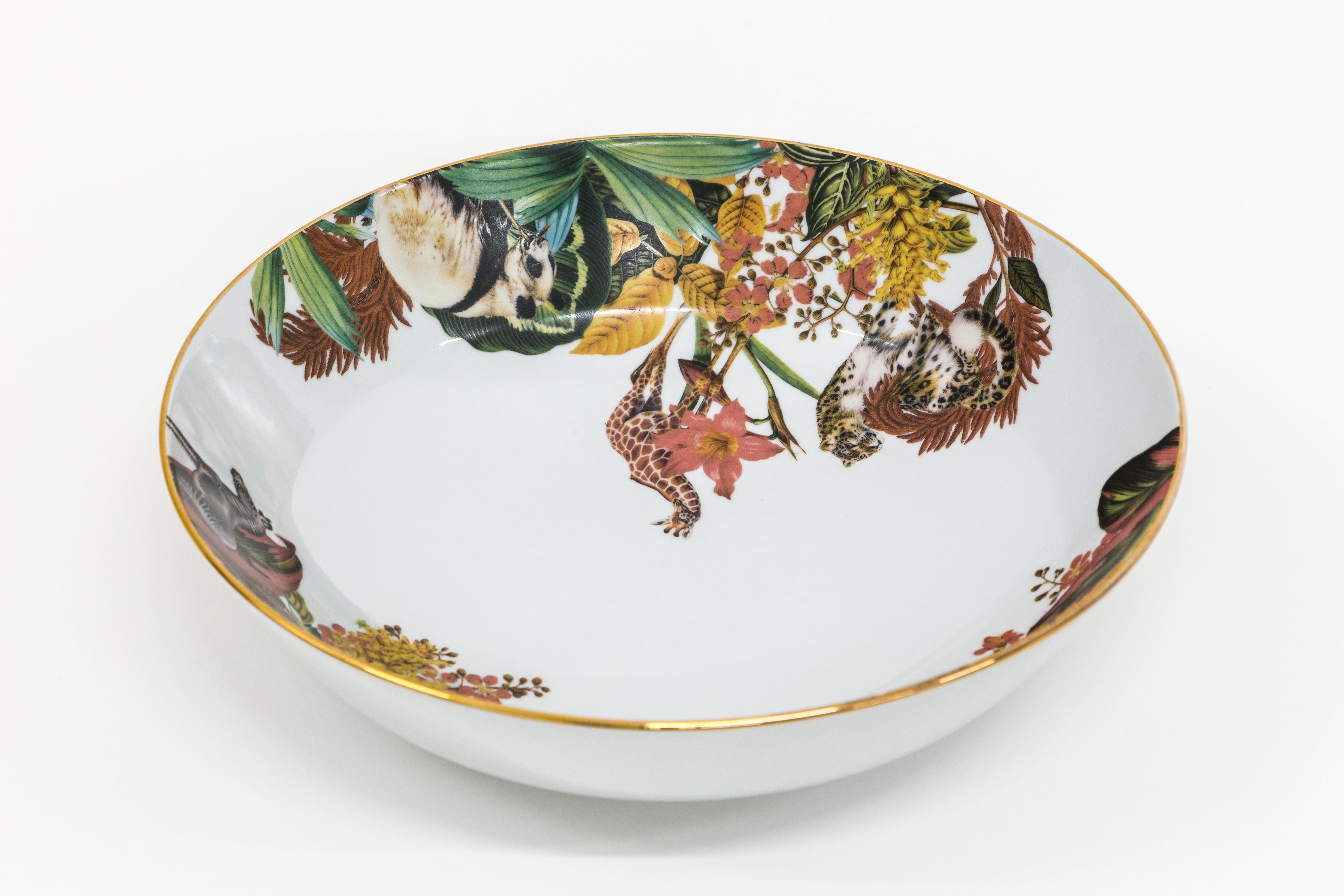 This 34cm diameter bowl is part of the Animalia collection by Grand Tour By Vito Nesta. The very versatile shape is suitable as a fruit stand, table centerpiece or ornamental bowl on any shelf. The rich design of tropical flowers hides several