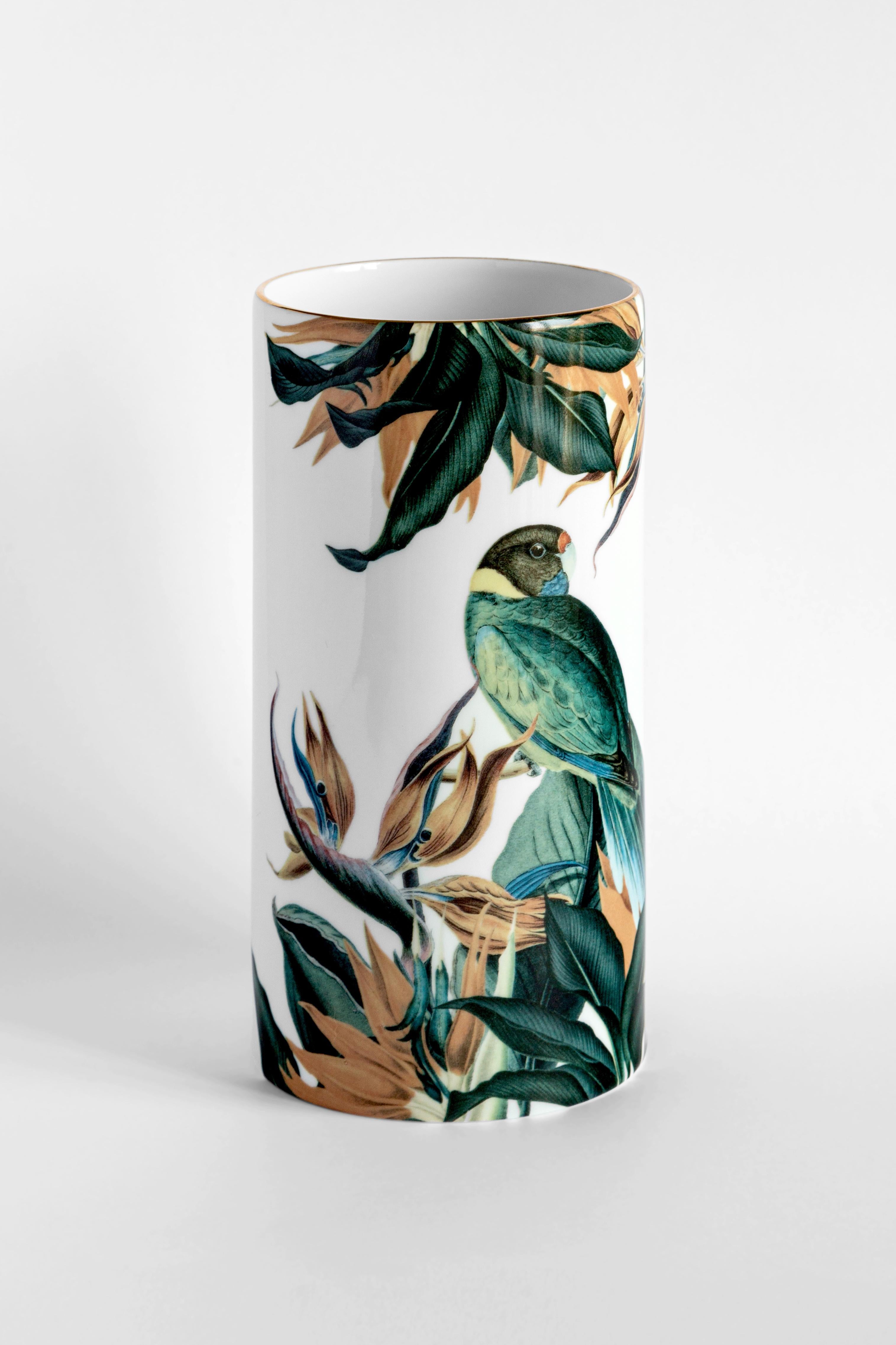 Part of the Animalia series from Vito Nesta's signature Grand Tour Collection, this vibrant yet delicate piece is an elegant vase which will enrich any living space. It features an exquisitely depicted parrot nestled against colorful tropical