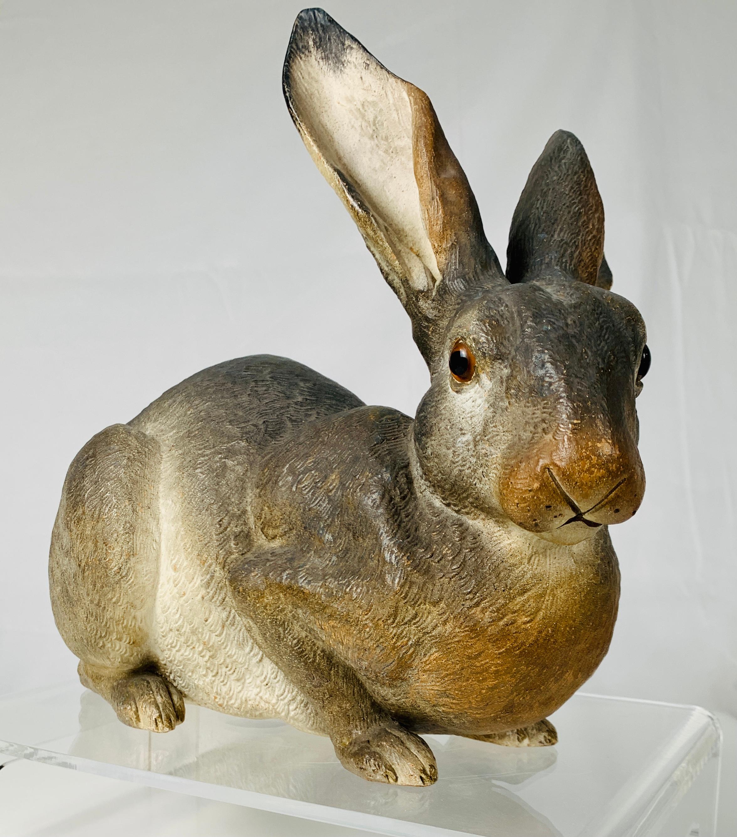 This is a lovely life-size hand-painted rabbit expertly modeled in terracotta. Combining a high-quality model and terrific painting with great attention to detail created this realistic sculpture that is so life-like. She has personality: sitting
