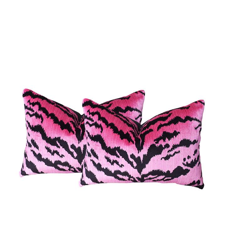 Animal motif tiger print lumbar pillow. Multiple available. The front features a gorgeous thick velvet animal print. The back features crisp black linen. Down-filled. Knife edge with zipper at the bottom. Fabric is designer and originates in Belgium.