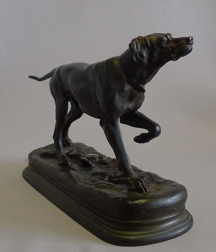 Superb antique patinated bronze model of a pointer by Jules Moingiez. Outstanding cast and in pristine condition this shows a pointer at work in a most skillful way. The pointer alert, head up and with left foreleg raised, listening and about to