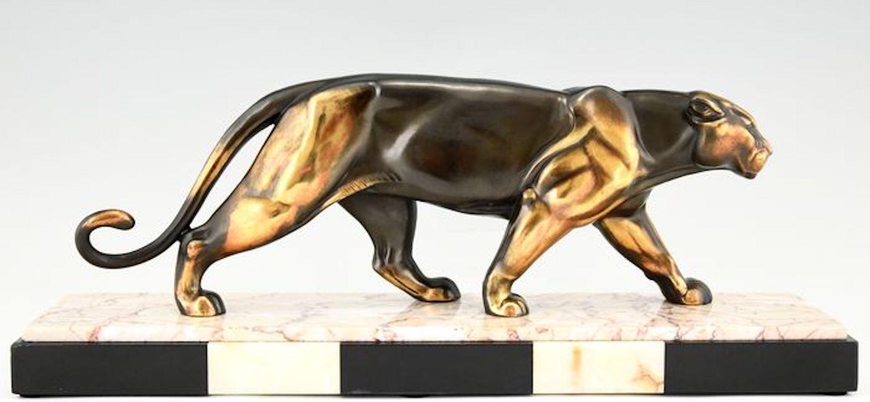 Bronze Animalier Art Deco sculpture representing a panther. Signed by sculptor Alexandre Ouline, France, 1930. 
Beautiful patina. On a marble pedestal, with inlay. Literature:
“Animals in bronze” Christopher Payne. Antique collectors club.