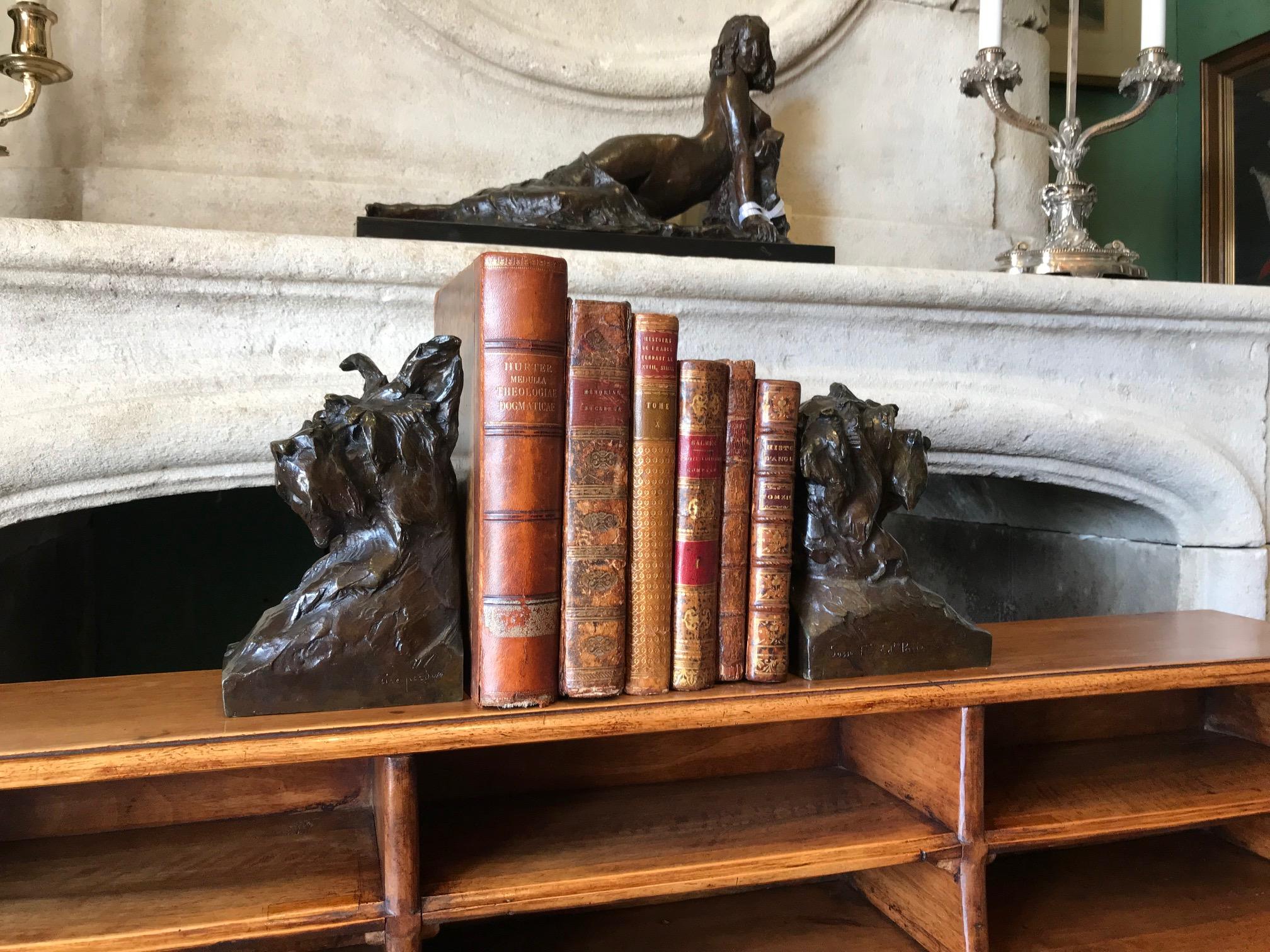 Wonderful pair of early 20th century Art Deco bronze Scotties Scottish Terrier dog heads bookends sculptures. One with ears up and the other with the ears down. Excellent color and detail, signed: M.Fiot, Maximilien Louis Fiot. 1886-1953. Animal