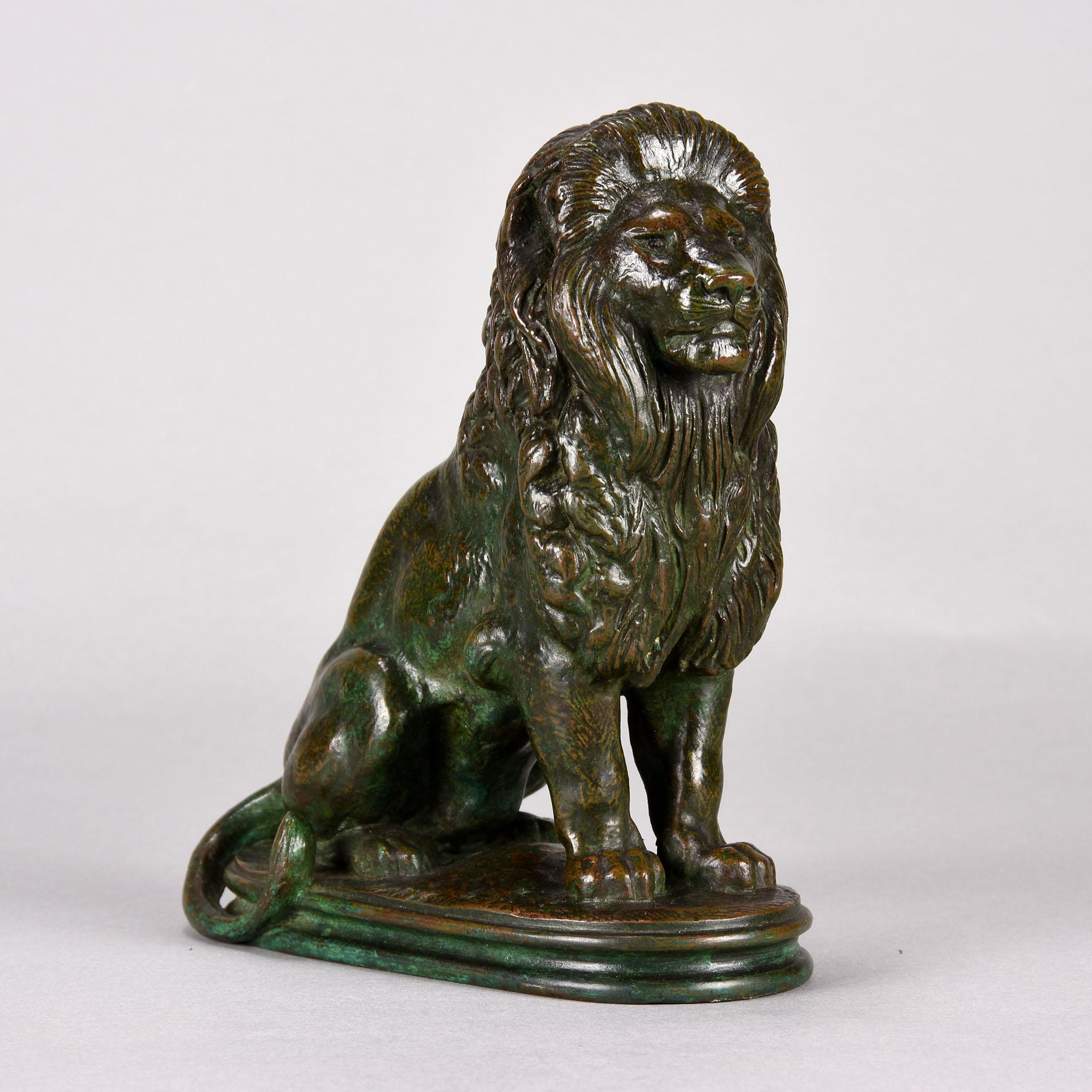 Magnificent 19th century French bronze figure of a majestic seated lion with beautiful autumnal, green, black, brown and orange patination and excellent hand finished surface detail on an oval naturalistic base with integral stepped plinth, signed