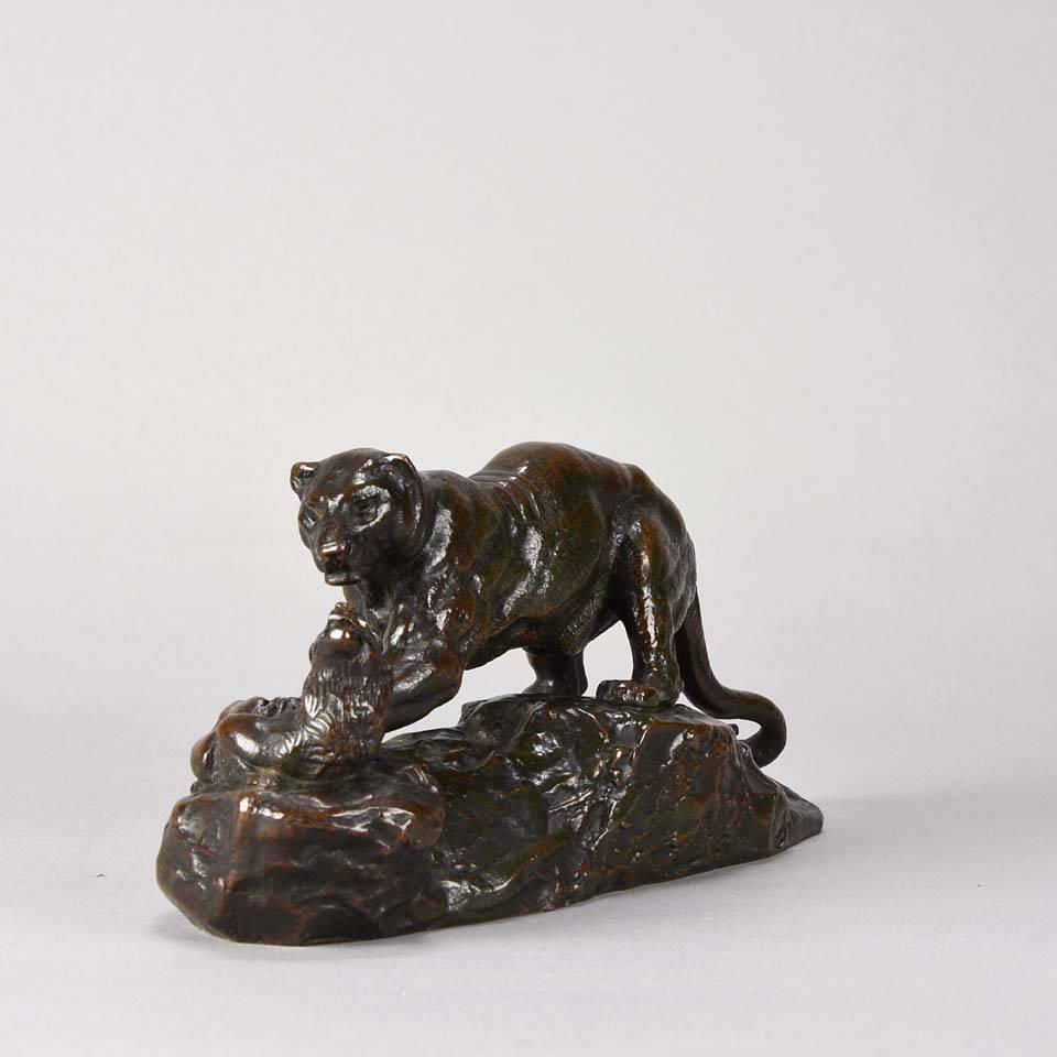 Superb mid-19th century French animalier bronze study of a powerful panther, its front paw holding down a zibeth cat. The surface of the bronze with excellent autumnal patina and very fine hand chased surface detail. From the artist’s own foundry