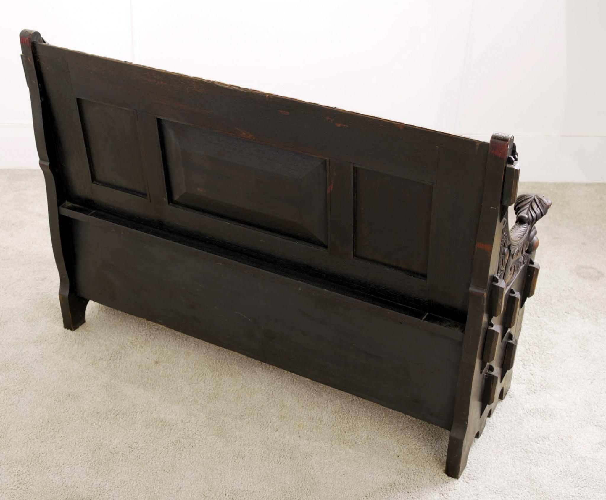 You are viewing a gorgeous Victorian carved oak settle or monks bench
Great piece for a hallway or room, the seat opens up to reveal the storage space inside
Very ornately carved with medieval scenes on the backrest and elaborate animal arms
Circa