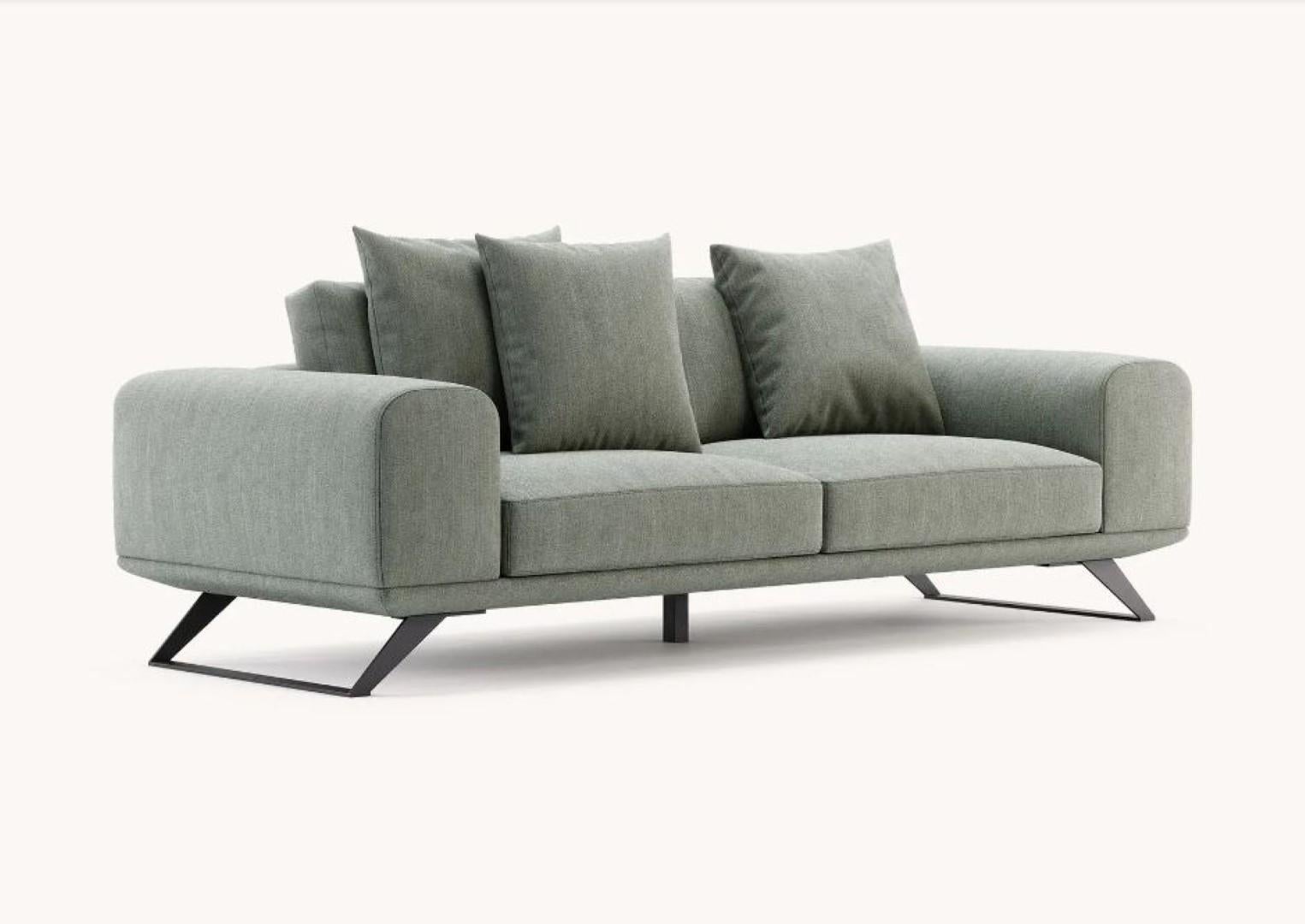 Aniston 3 Seats Sofa by Domkapa
Materials: Fiber, Black Texturized Steel. 
Dimensions: W 230 x D 97 x H 83 cm.
Also available in different materials. Please contact us.

Aniston sofa is a modern design piece where rectangular lines merge