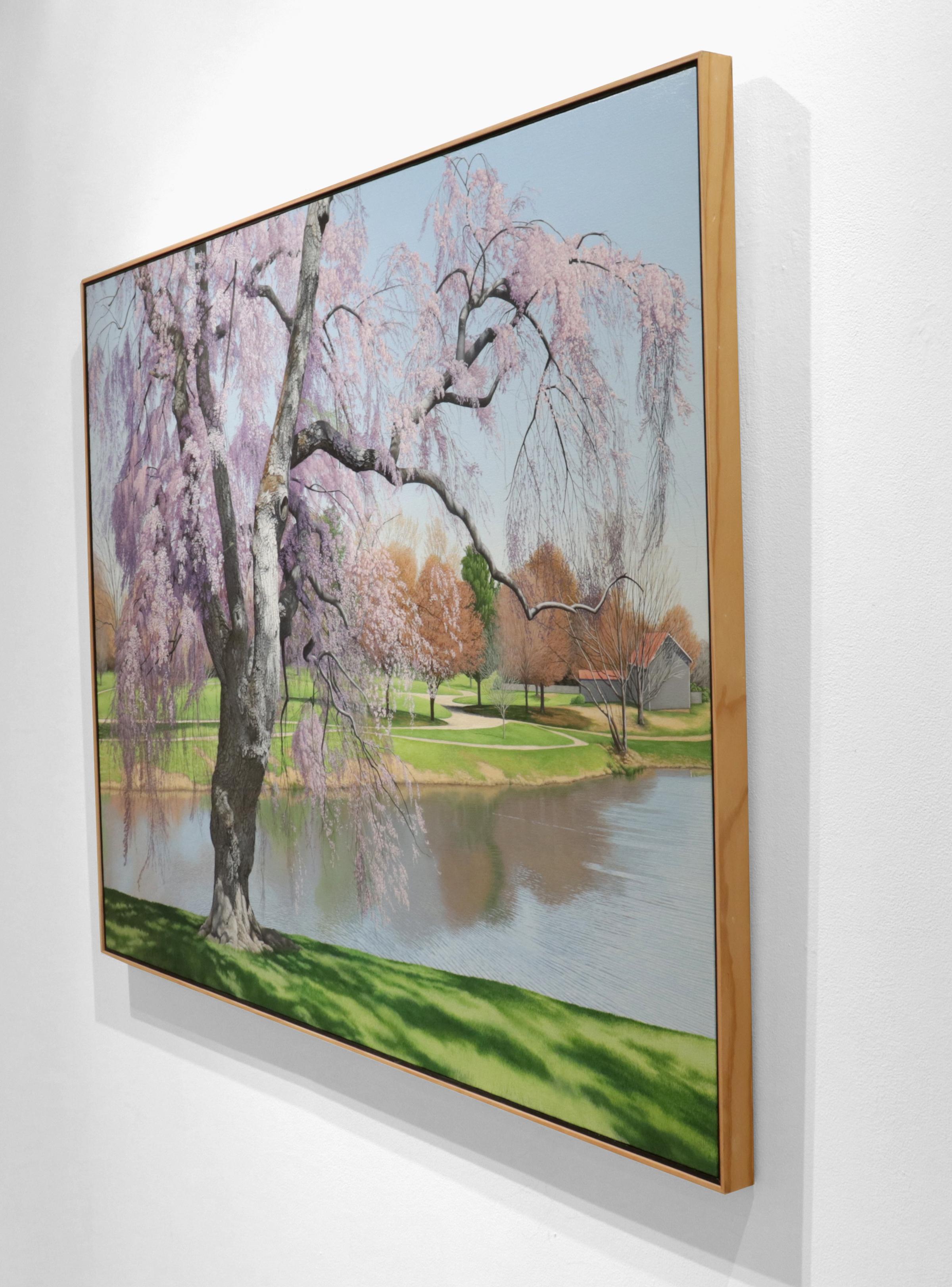 Original Landscape painting by New Jersey artist Anita Mazzucca. A lavender willow tree stands before a pond and green hills with a blue sky. Mazzucca is a highly coveted artist known for her meticulous brushwork.