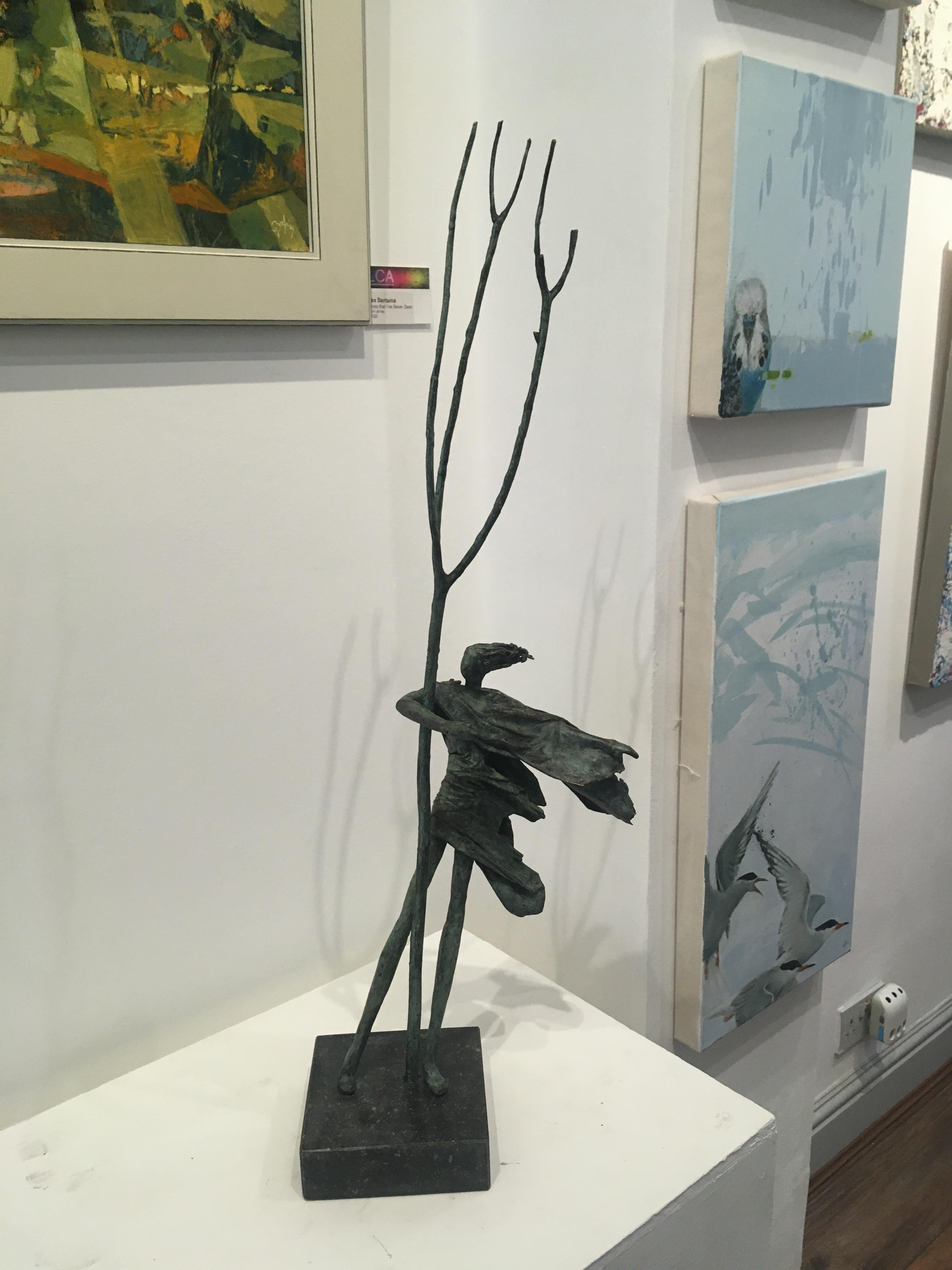 Hold Tight - contemporary figurative standing female bronze sculpture tree windy - Contemporary Sculpture by Anke Birnie