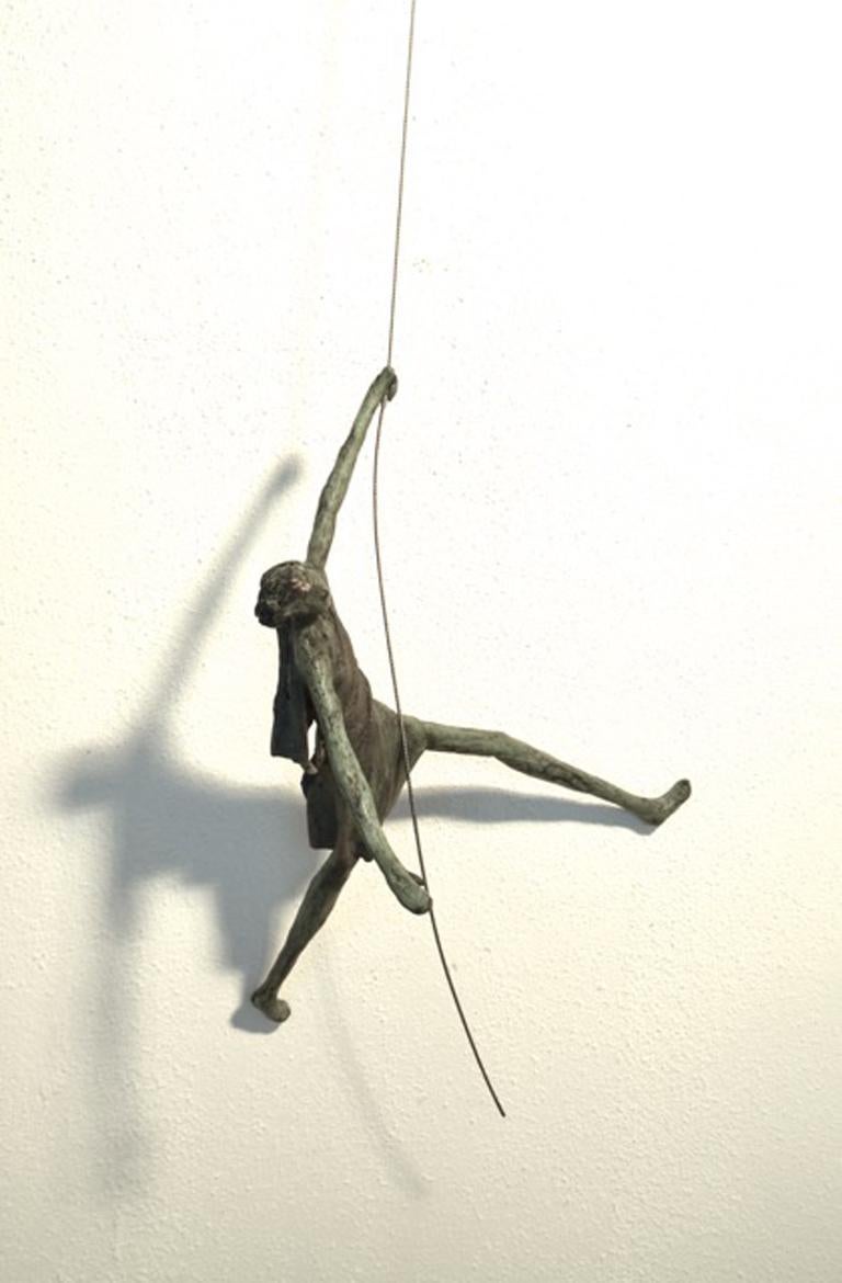 Anke Birnie Figurative Sculpture - Legs on the Wall II n.4305 - hanging sculpture human in motion