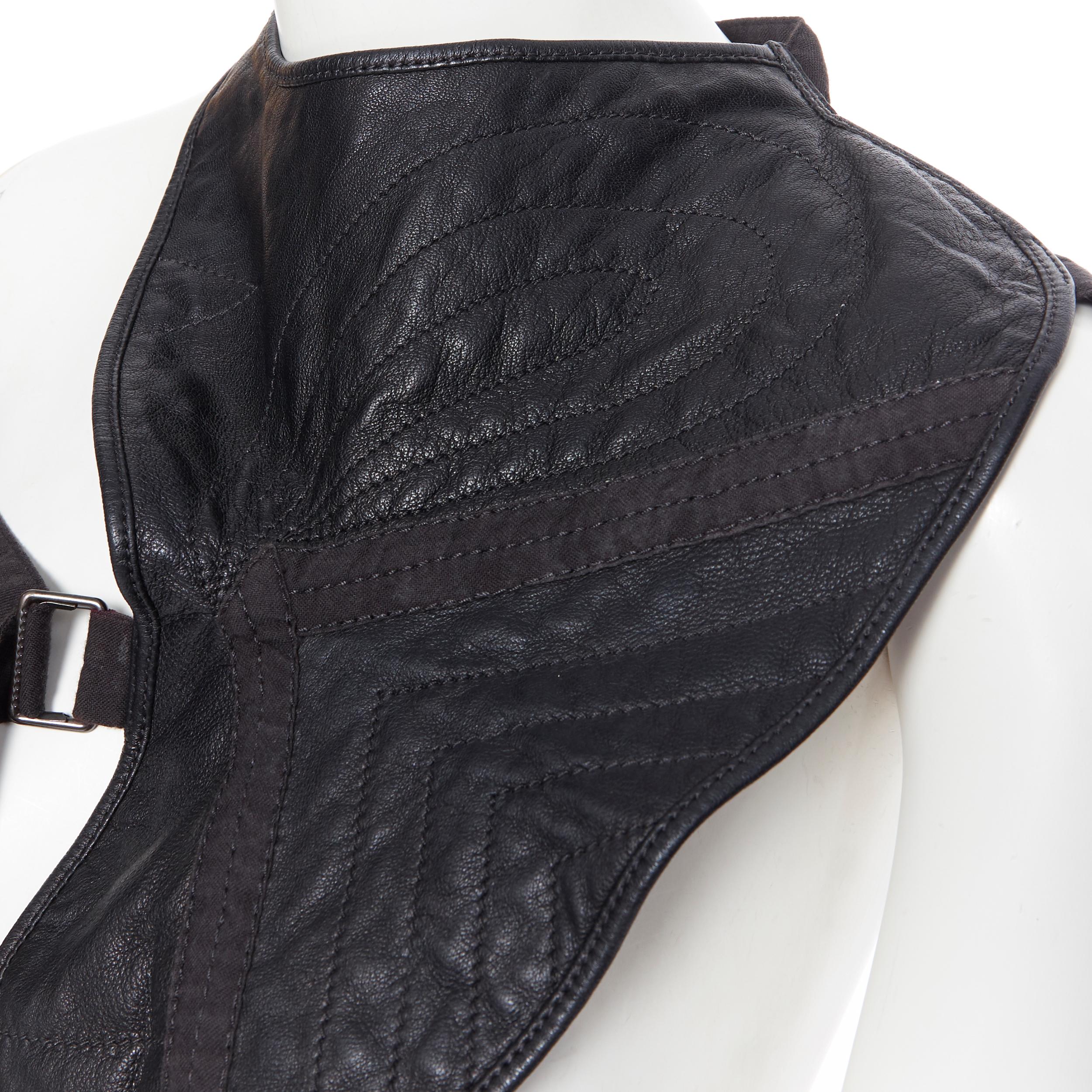 ANN DEMEULEMEESTER black contour stitched strapped harness leather piece top S
Brand: Ann Demeulemeester
Designer: Ann Demeulemeester
Model Name / Style: Leather harness
Material: Leather
Color: Black
Pattern: Solid
Closure: Buckle
Extra Detail:
