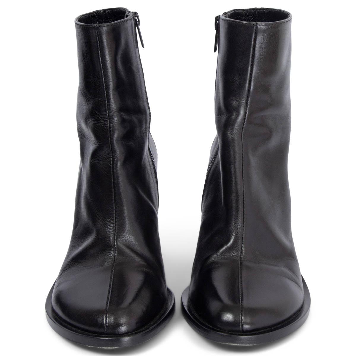 100% authentic Ann Demeulemeester Lisa ankle boots in black polished calfskin with concave heel shape. Open with a inner-side zipper. Have been worn and are in excellent condition. Come with dust bags.

Measurements
Imprinted Size	37
Shoe