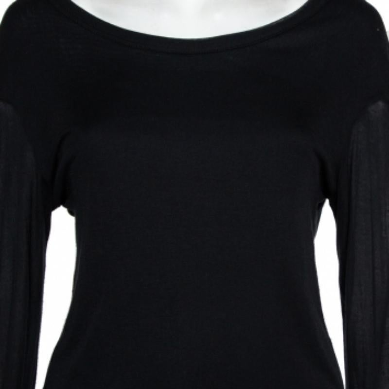This women's top by Ann Demeulemeester features stylish cuts on the long sleeves and a sheer back. It is made from quality materials and designed to pair well with both pants and skirts.