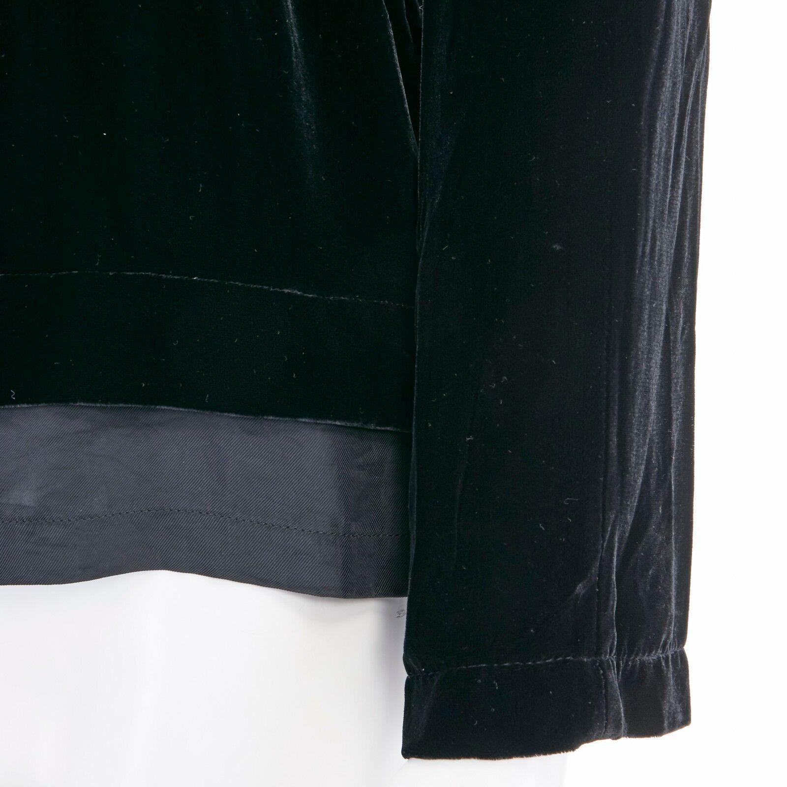 ANN DEMEULEMEESTER black velvet elasticated waist long sleeve blouse top FR36 S
            
ANN DEMEULEMEESTER
Black velvet . Round necklien . Long sleeve . Elasticated fitted waist . Zip back closure . Layered hem

CONDITION
Excellent, no flaws to