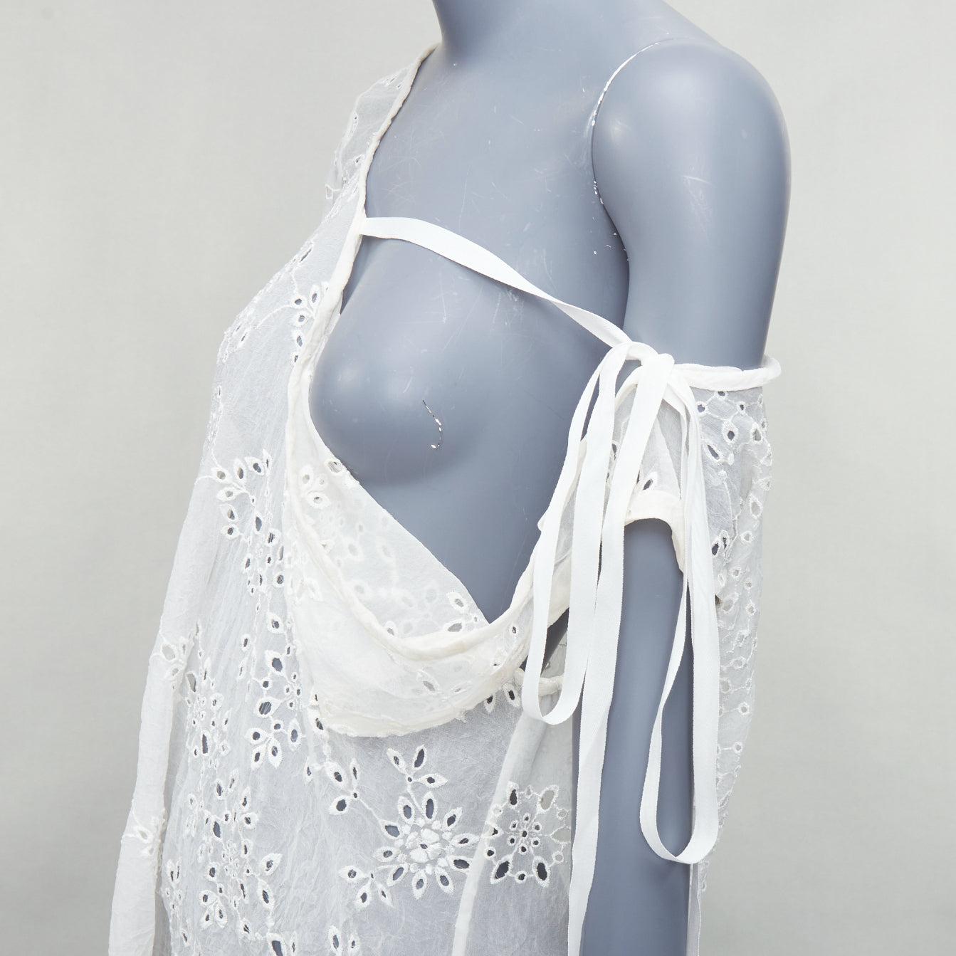 ANN DEMEULEMEESTER Carlatti cream silk blend eyelet drape top FR34 XS
Reference: ECLO/A00030
Brand: Ann Demeulemeester
Model: Carlatti
Material: Silk, Blend
Color: Cream
Pattern: Lace
Closure: Self Tie
Extra Details: Can be draped freely.
Made in: