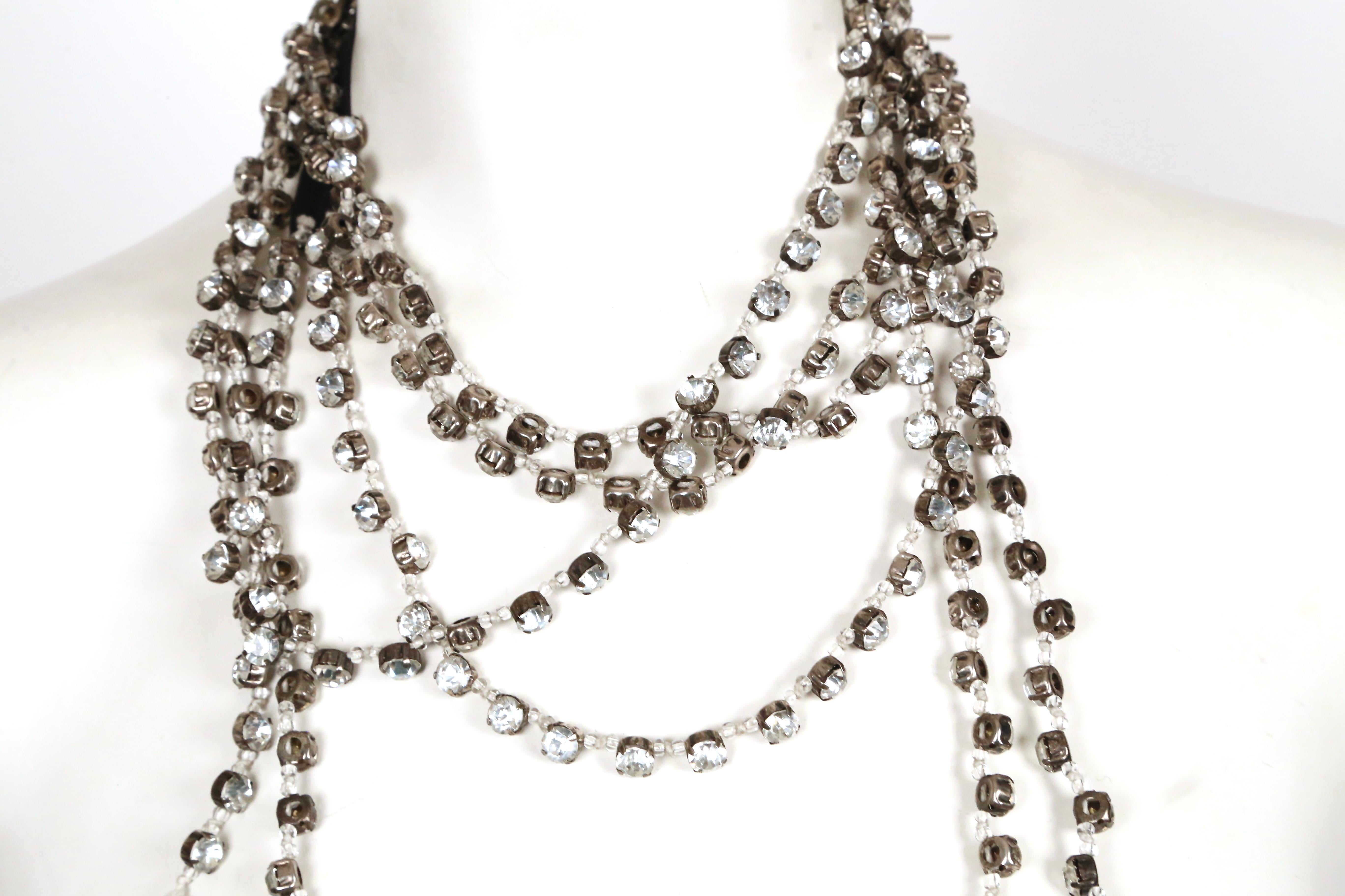 Stunning, extra long,  faceted-rhinestone and clear round stone beaded lariat/wrap style necklace or belt set in oxidized silver with fabric back from Ann Demeulemeester.  Faceted rhinestone are set in silver settings strung together with clear