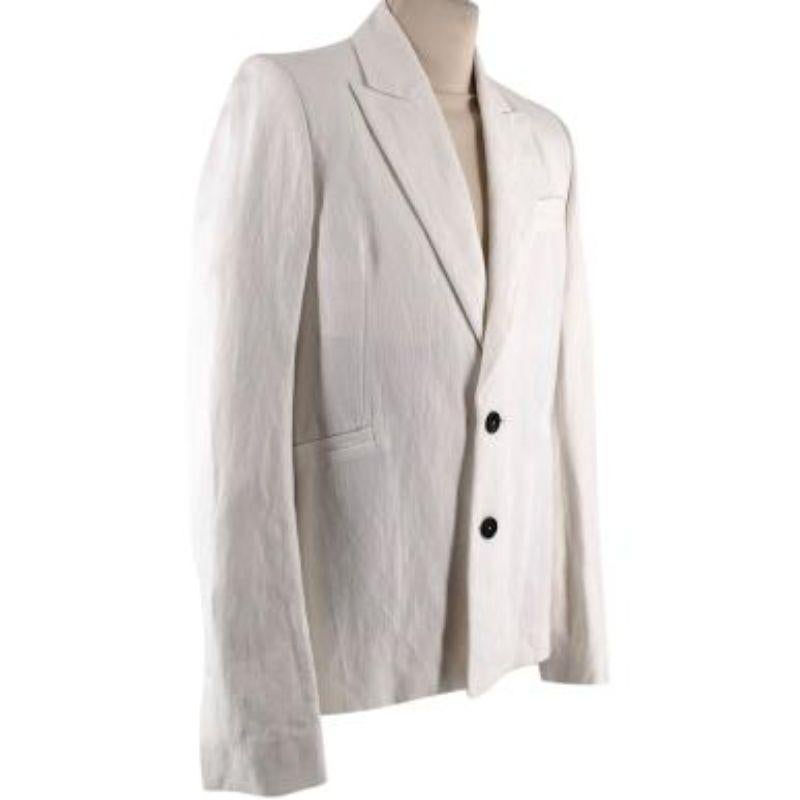 Ann Demeulemeester Cream Linen Single Breasted Blazer

- Single breasted
- Padded shoulders
- Two-button fastening
- Vented cuffs
- Three exterior pockets
- One interior pocket

Material
59% Ramie and 41% Viscose

Dry clean only

Made in