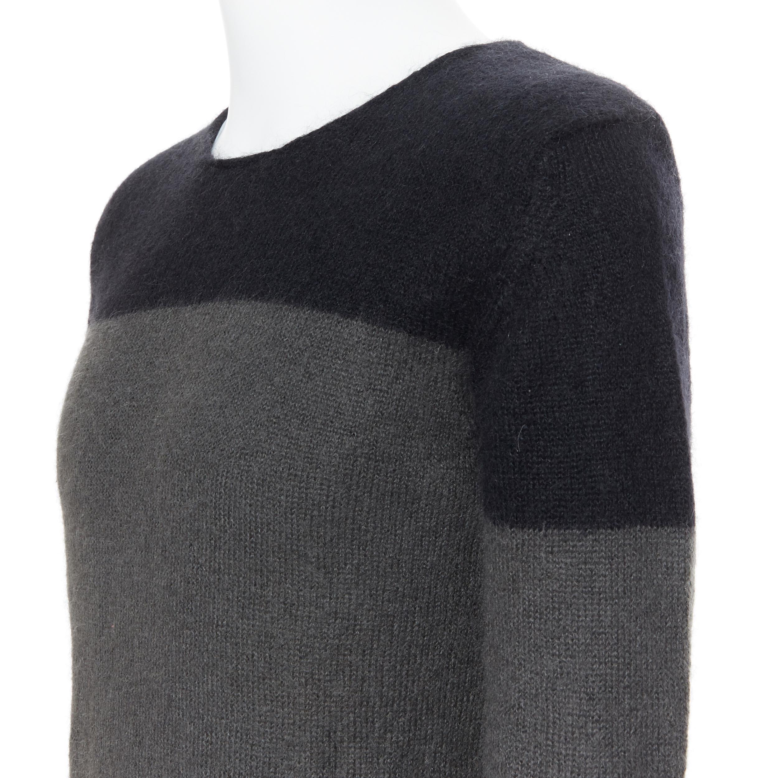 ANN DEMEULEMEESTER mohair wool black grey colorblocked sweater S
Brand: Ann Demeulemeester
Model Name / Style: Sweater
Material: Mohair, wool
Color: Grey
Pattern: Solid
Extra Detail: Pullover sweater.
Made in: Belgium

CONDITION: 
Condition: