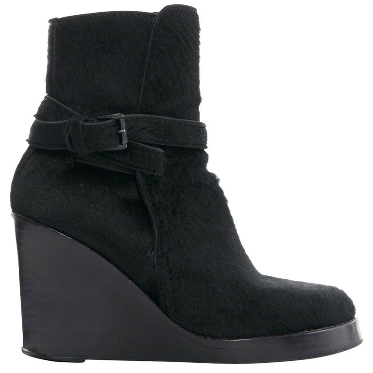 skin ankle boots