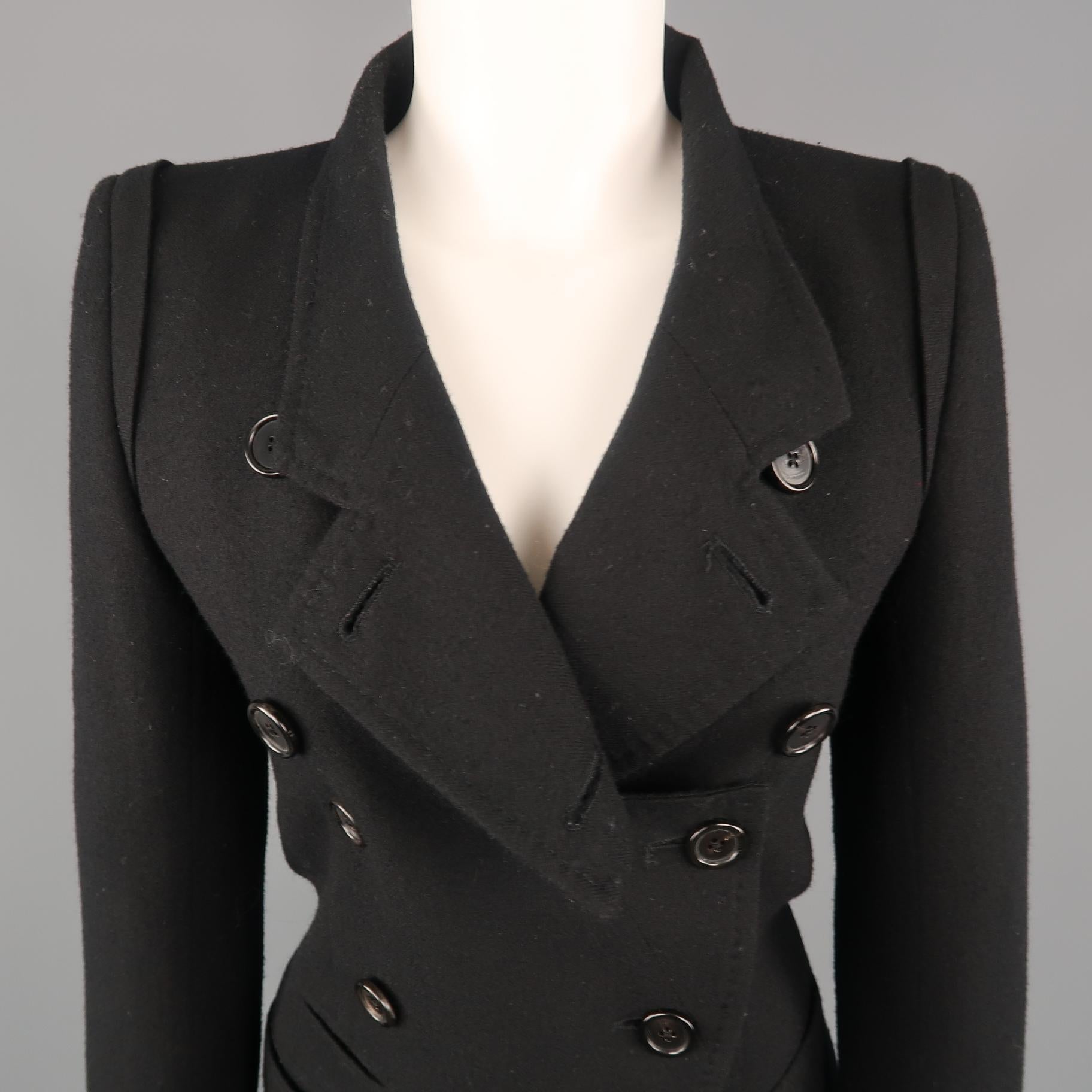 ANN DEMEULEMEESTER jacket comes in black wool with a double breasted slit lapel button closure front, slit pockets, and shoulder details. Made in Portugal.
 
Very Good Pre-Owned Condition.
Marked: EU 36
 
Measurements:
 
Shoulder: 15 in.
Bust: 34