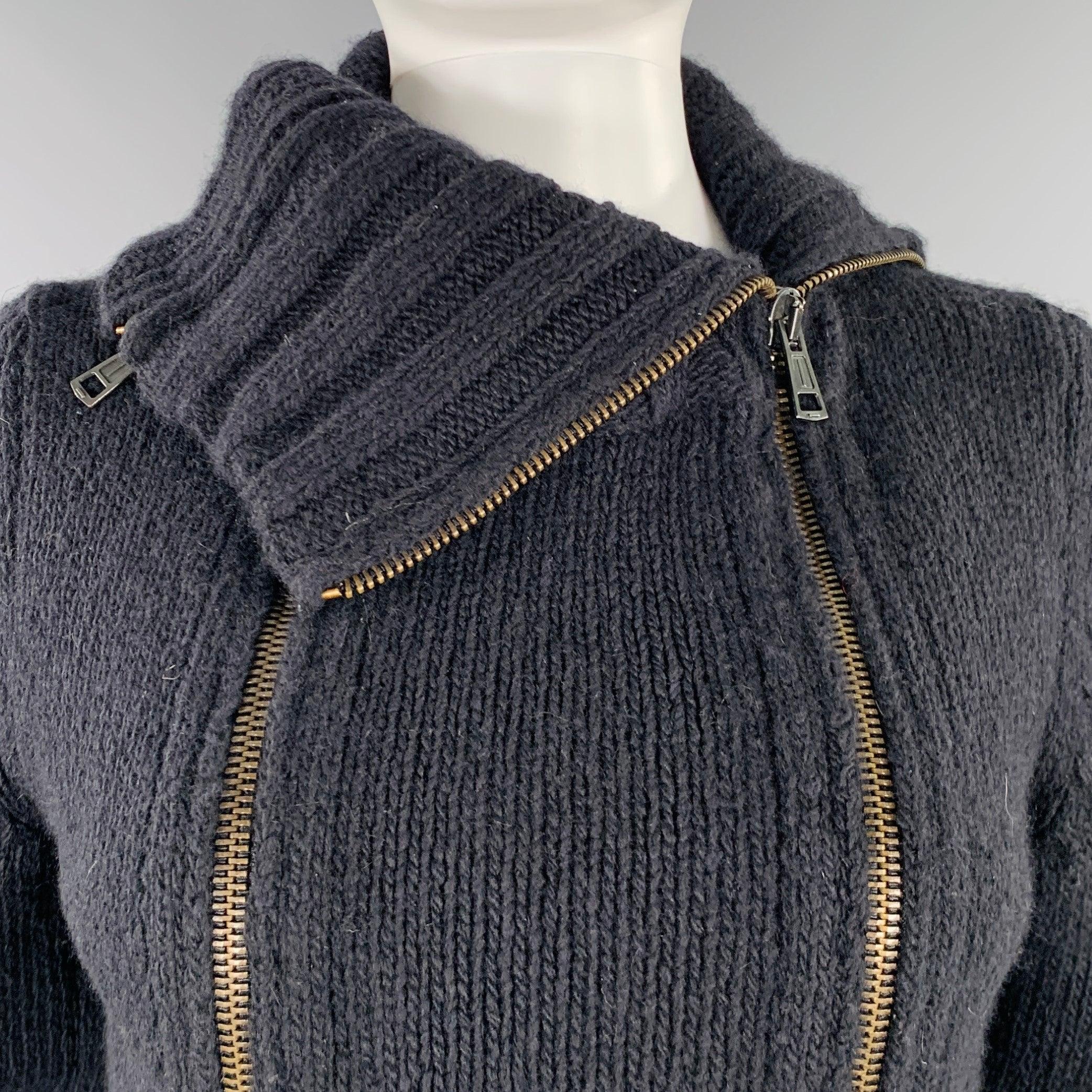 ANN DEMEULEMEESTER cardigan
in a black merino wool angora blend knit featuring long sleeves, and a double zipper design for versatile styling options. Made in Belgium.Very Good Pre-Owned Condition. Moderate pilling. 

Marked:   IT 40 

Measurements: