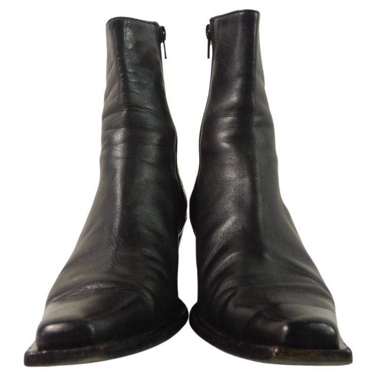 Ann Demeulemeester slant heel boots in soft black leather. Avant-garde silhouette with slanted heel. These have a side zip and pointy square toe. 

These are in good used condition. The leather is soft and supple, the zippers work easily. 

These