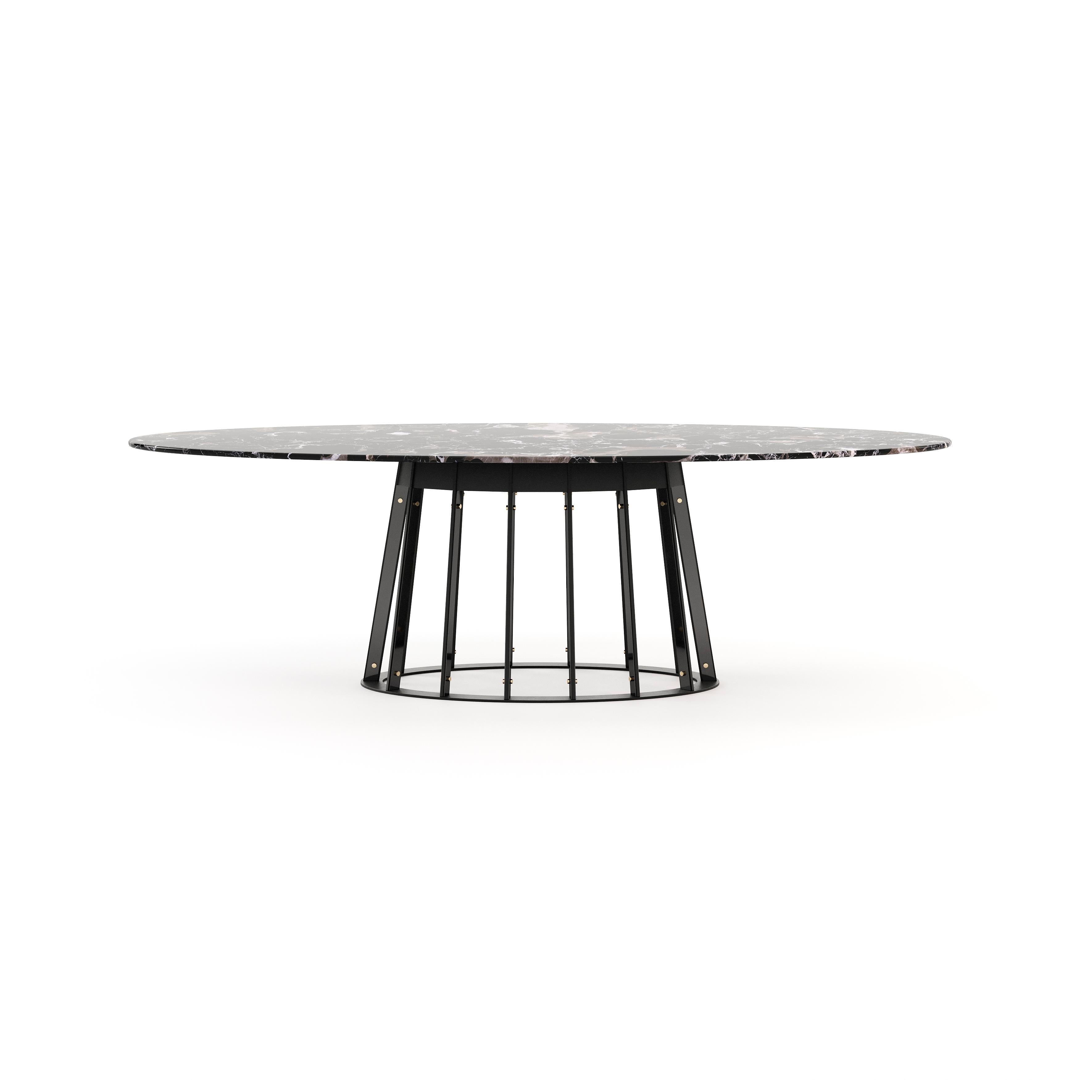 Ann dining table is a glamorous piece for dramatic spaces. The cylindrical-shaped base adds a refined twist to this timeless table, contrasting with the oval countertop made of dark wood. Ann features a tubular conic structure produced by Laskasas