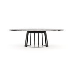 Oval dining table with a metal structure and custom tabletop