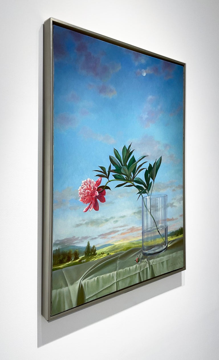 Photo-realist still life painting of a pink peony against a country landscape with blue mountains and a blue, moon-lit sky just after sunset 
