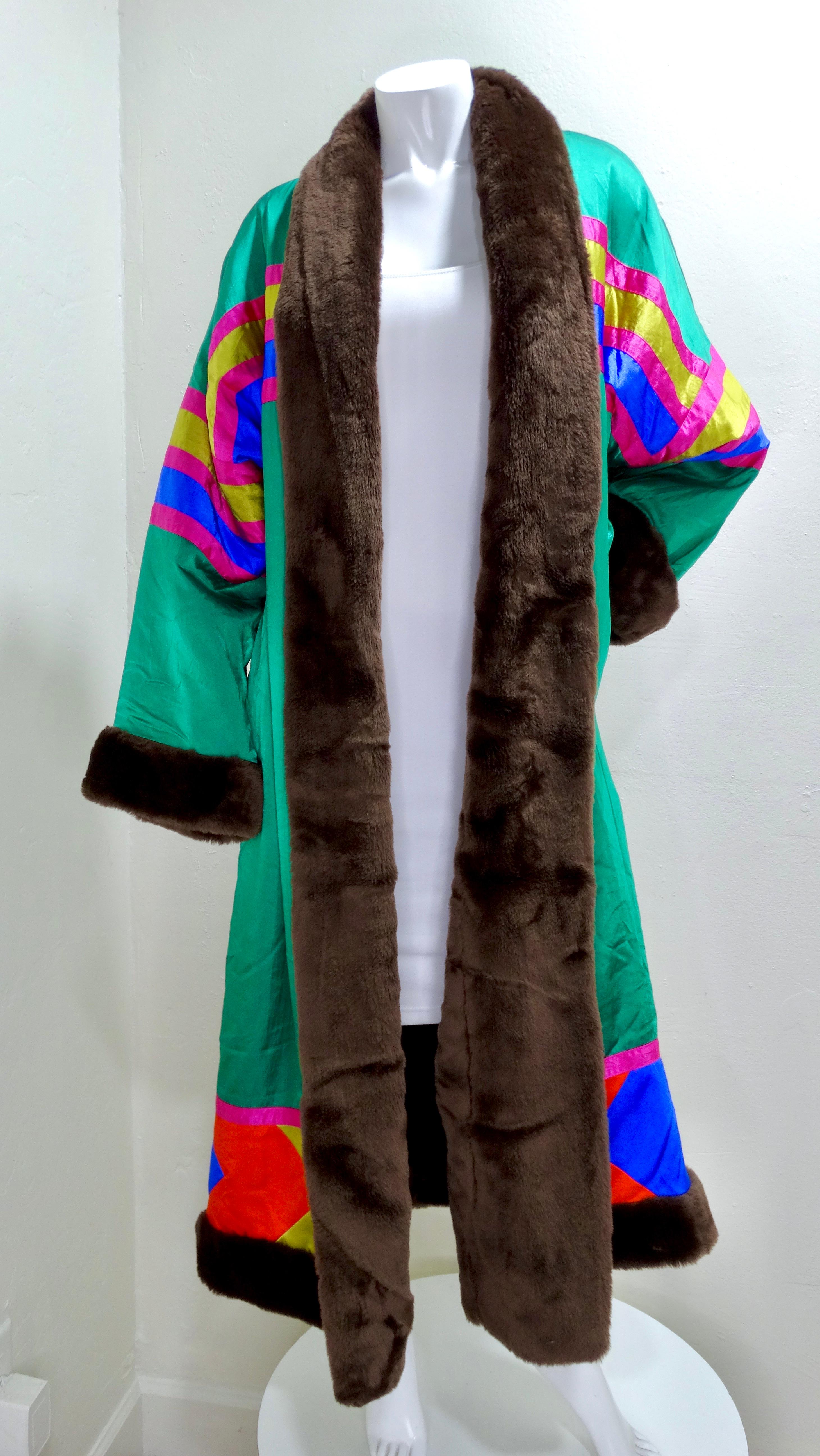 There's no doubt you will feel your most powerful self in this color block coat. Beautifully vibrant colors make up the whole coat contrasted with a rich chocolate brown fur. This coat can also be worn reversed. The oversized fit will be perfect for