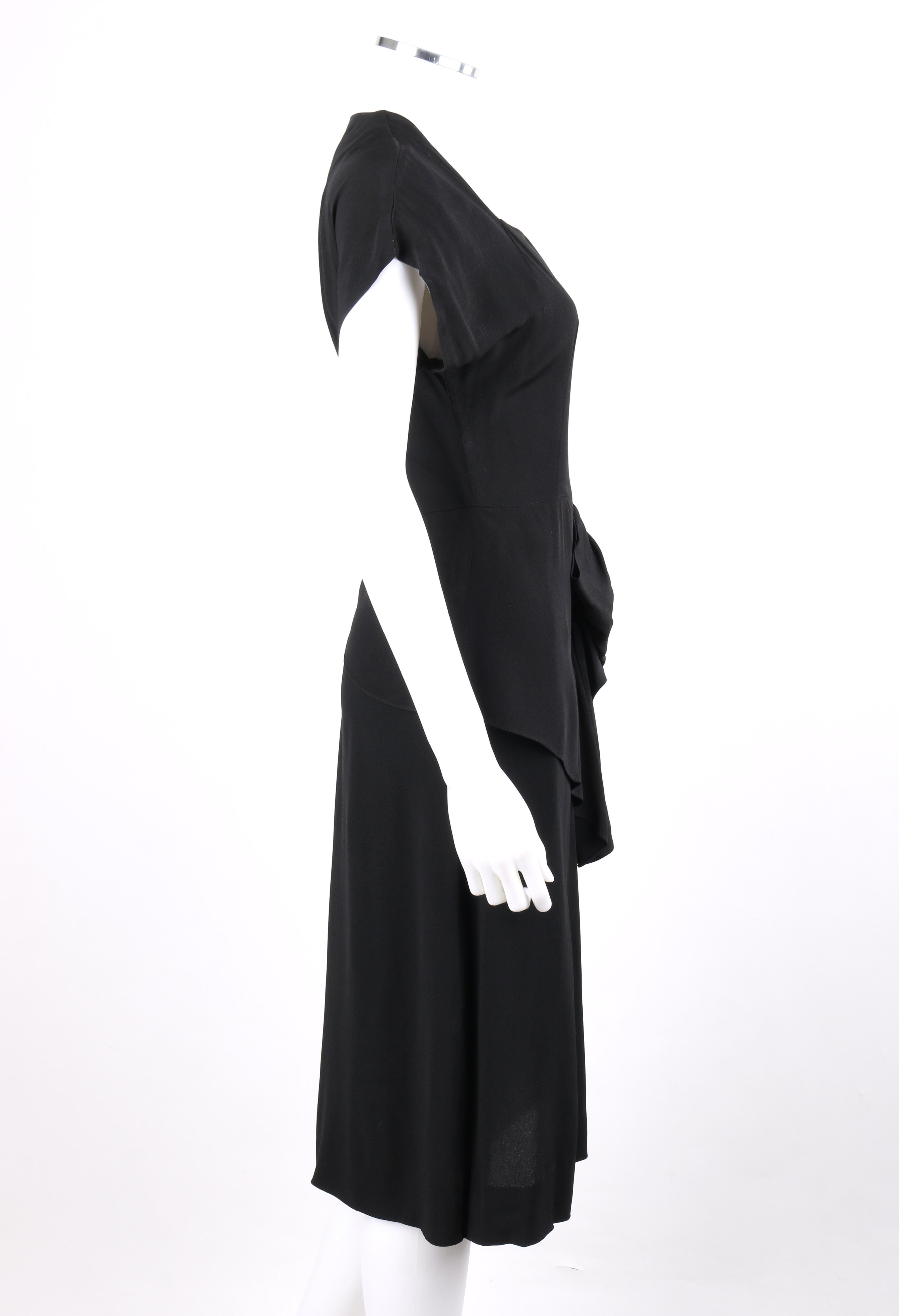 ANN WALKER c.1940’s Black Crepe Ruched Bow Peplum Short Sleeve Afternoon Dress

Circa: 1940’s 
Label(s): Ann Walker Original
Style: Peplum dress
Color(s): Black
Lined: No 
Unmarked Fabric Content (feel of): Rayon crepe (shell); metal
