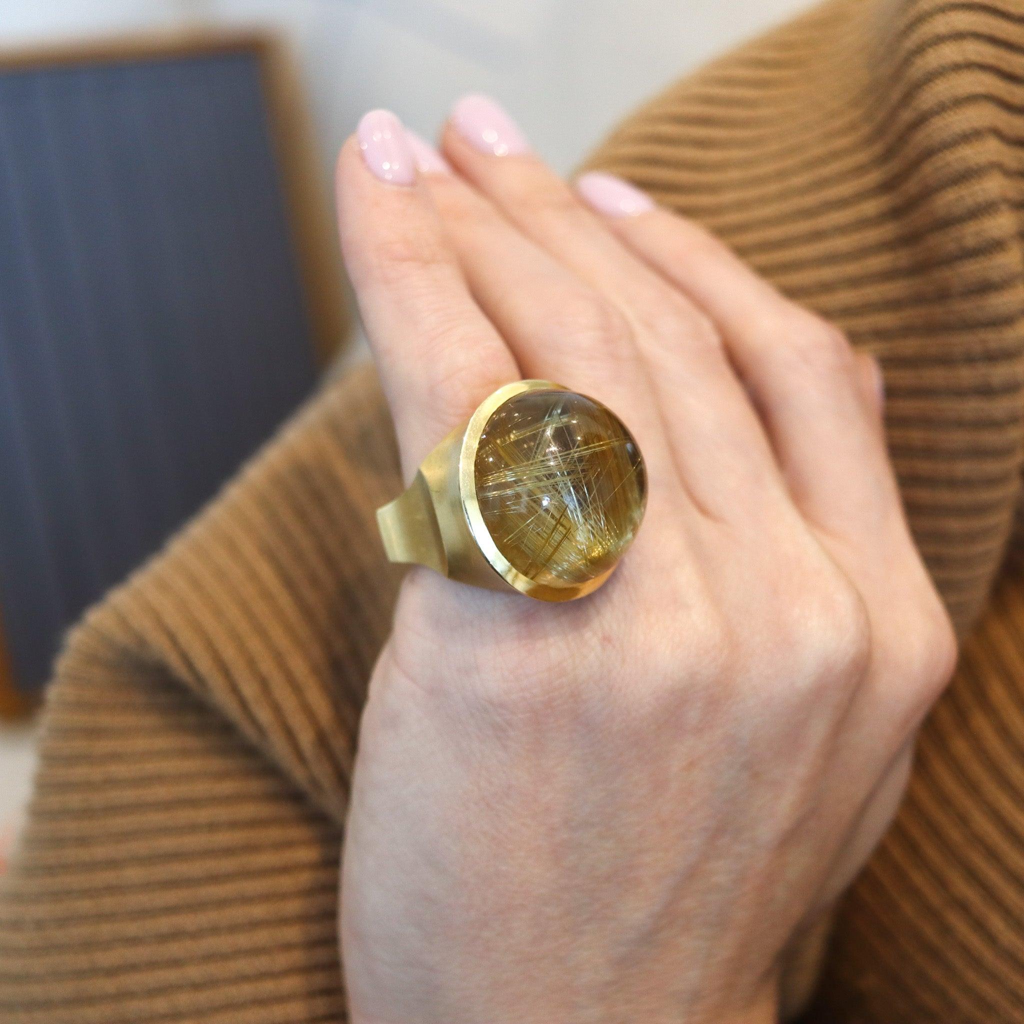 A sculptural artist ring designed by Tamsen Ann Ziff.

This exuberant artist-sculptural ring is a one-of-a-kind creation by the goldsmith artist Tamsen Z. Ann Ziff. The ring is part of the Silhouette collection designed in New York City with