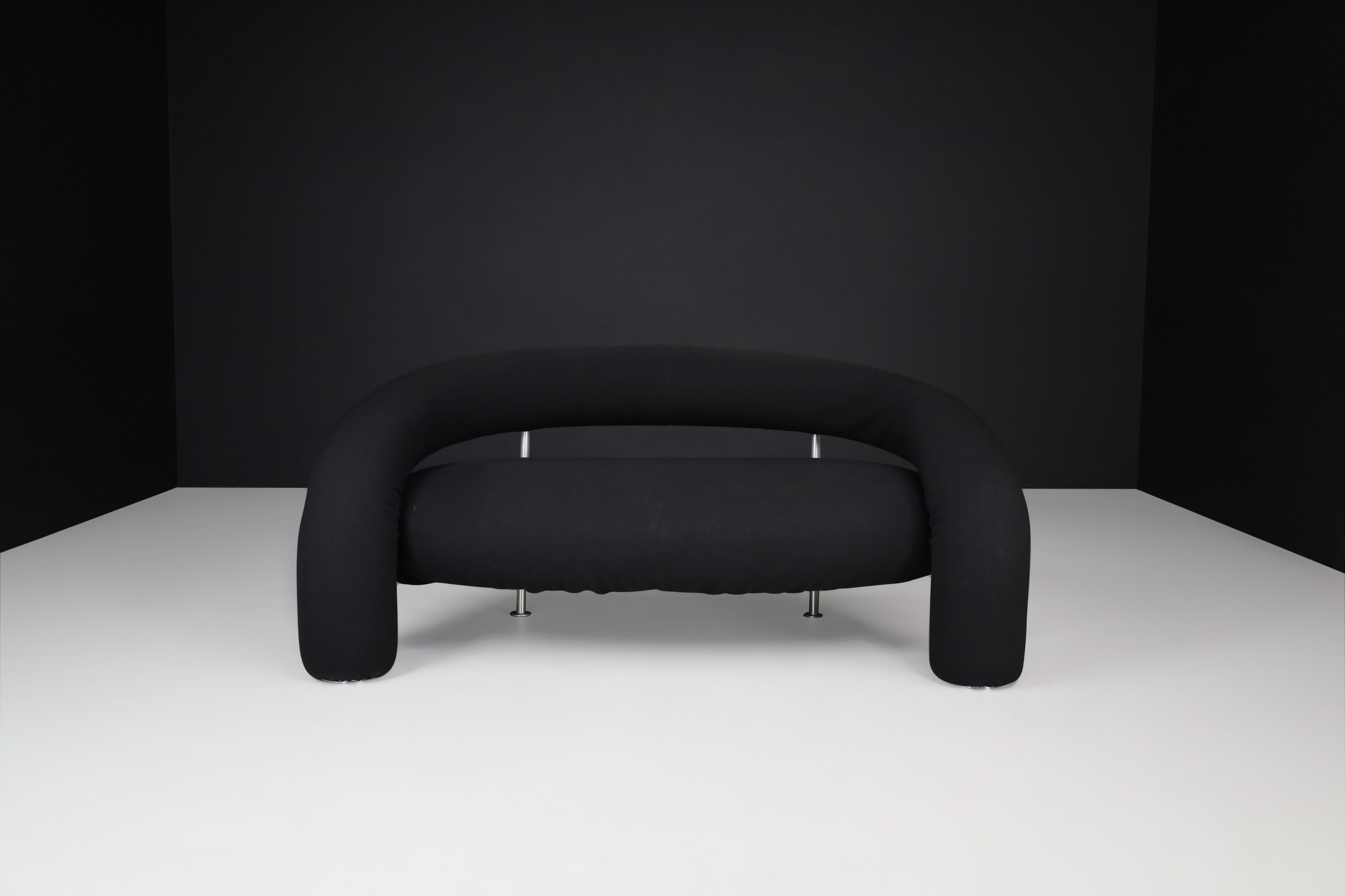 Anna and Carlo Bartoli for Rossi di Albizzate Sofa. 

Postmodern designer sofa model 'Tube' designed by Anna & Carlo Bartoli for Italian high-end furniture manufacturer Rossi di Albizzate. This iconic sofa has a metal frame padded with