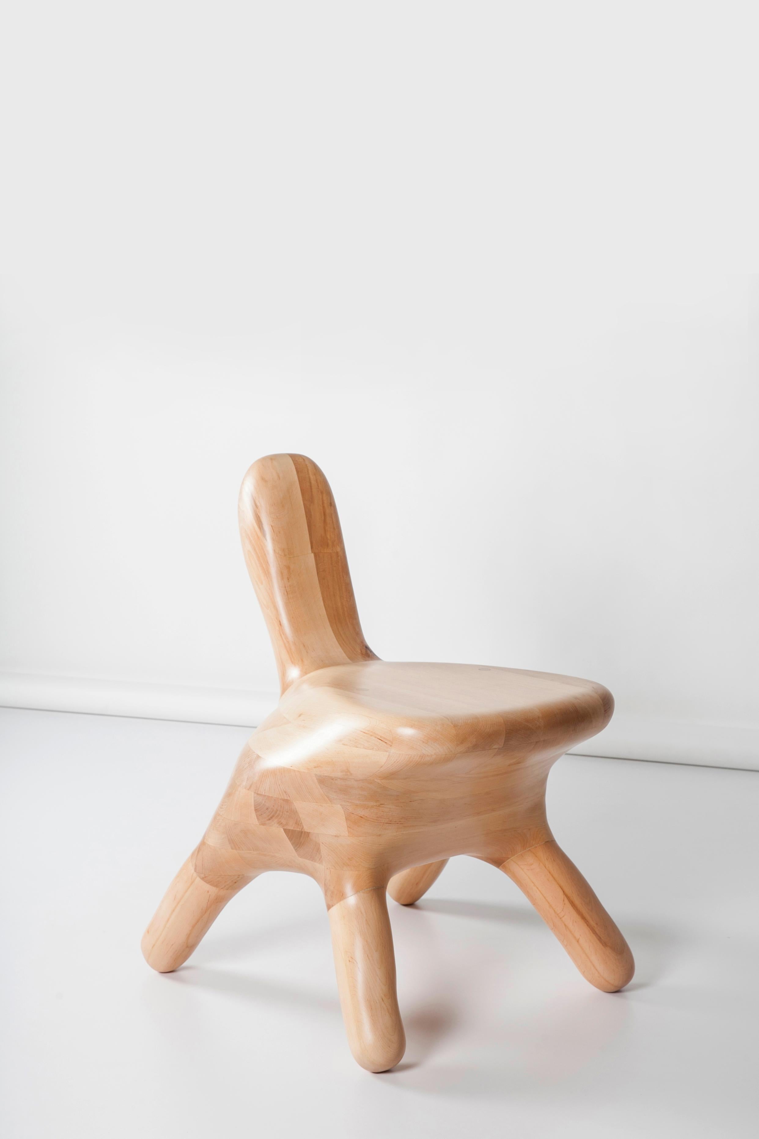 Anna Bera shape N2 chair by Nów
Designed by Anna Bera
Dimensions: D 58 x W 51 x H 72 cm
Materials: hand-carved alder wood

As an artist, woodcarver and carpenter, Anna creates wooden furniture pieces, mainly storages and cabinets crafted by hand in
