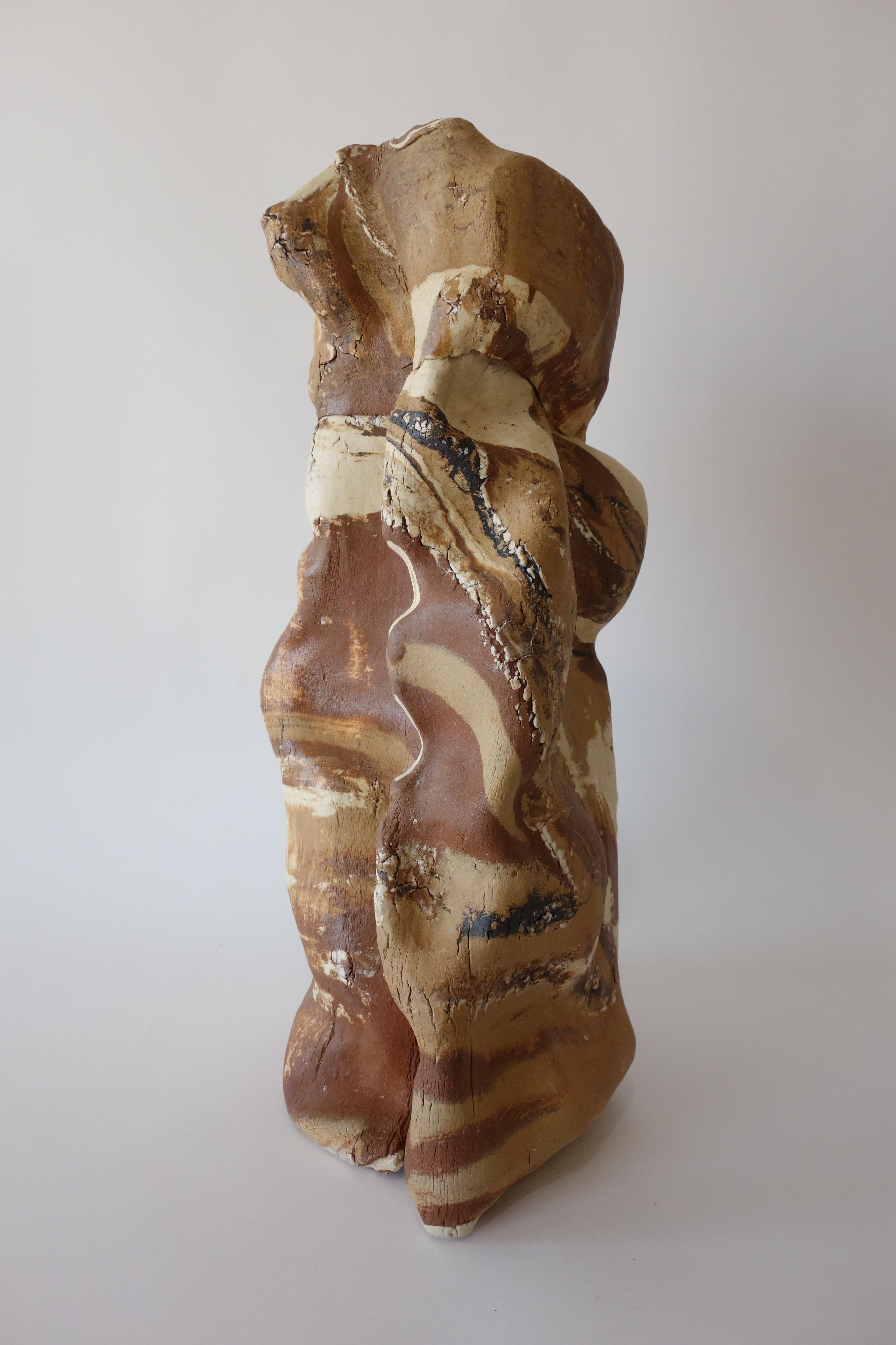 Ceramic sculpture of combined clay bodies, unique processes developed by Anna Bush Crews, looks to inherent qualities in the material, the way it smoothes, or not, the way it stretches or breaks up in actions that make the shapes and form the