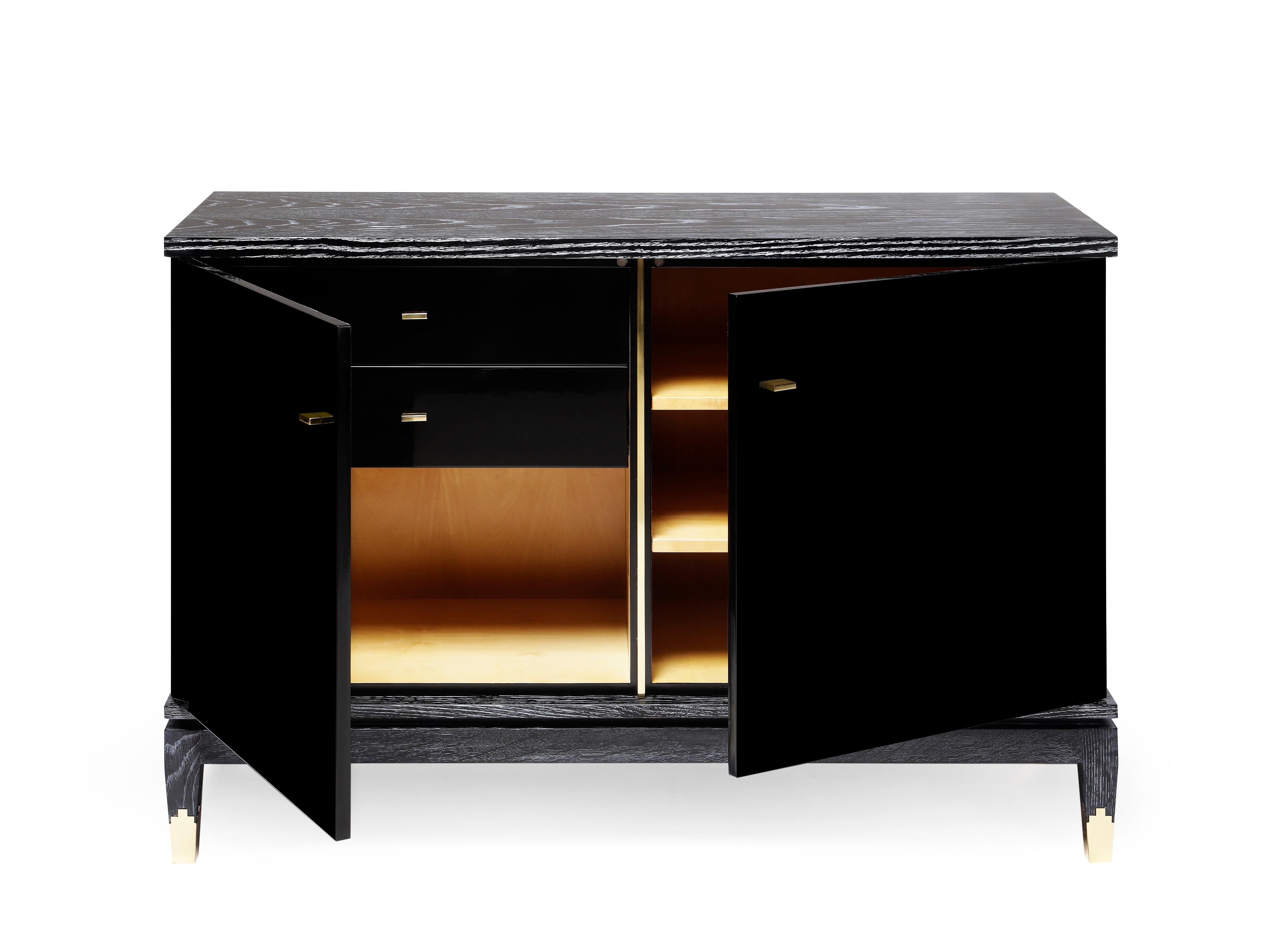 Anna Cabinet, Brushed Oak and Black Limed Finish, Handcrafted by Duistt

Anna is an imposing and elegant cabinet. With a high gloss lacquered body that contrasts with the brushed oak top and feet with lime finish. The delicate brass details add