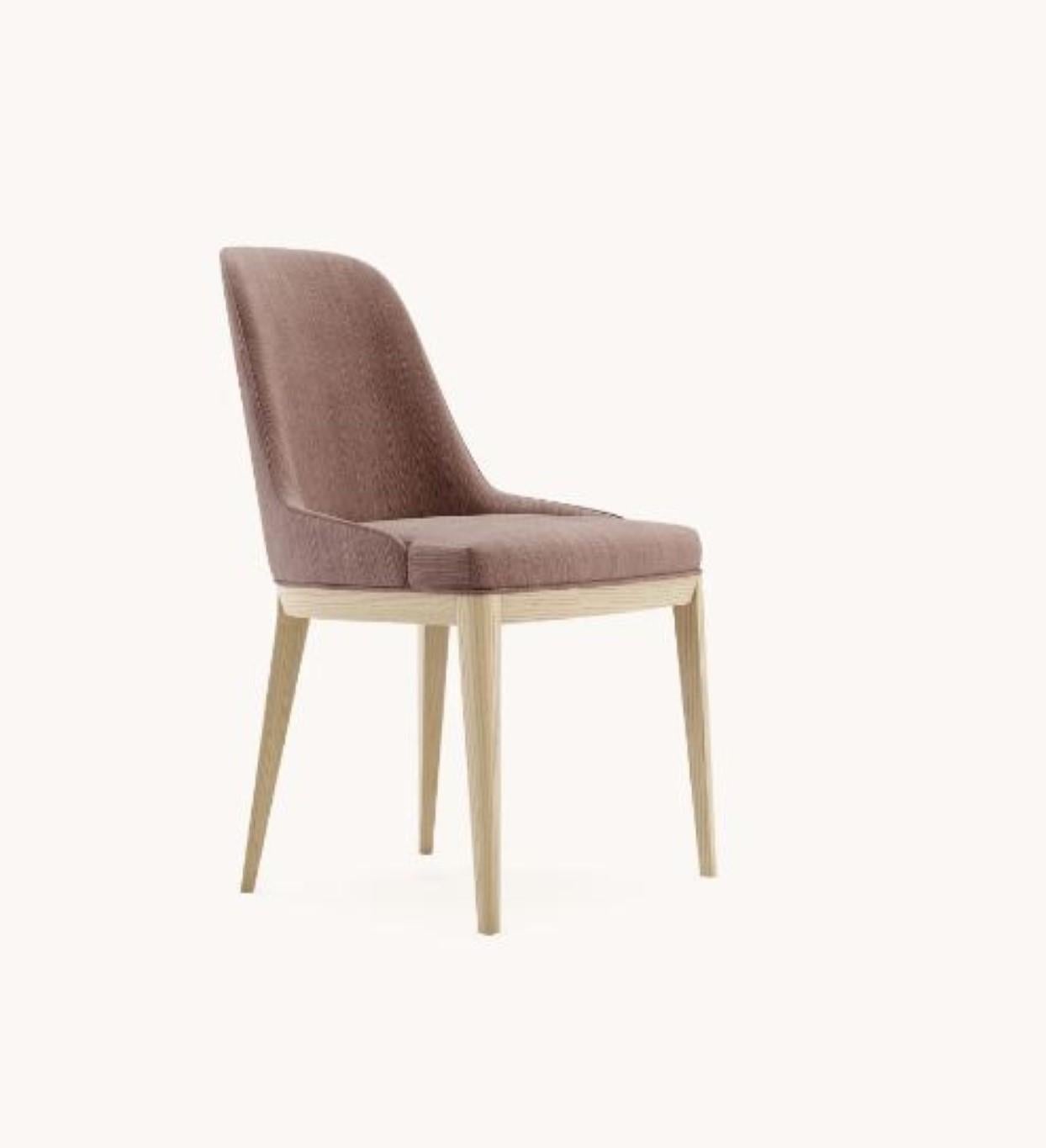 Anna Chair by Domkapa
Materials: Natural ash, Velvet.
Dimensions:  W 56 x D 57 x H 86 cm. 
Also available in different materials. Please contact us.

This timeless chair design is the result of a mature awareness process inspired by different ideas