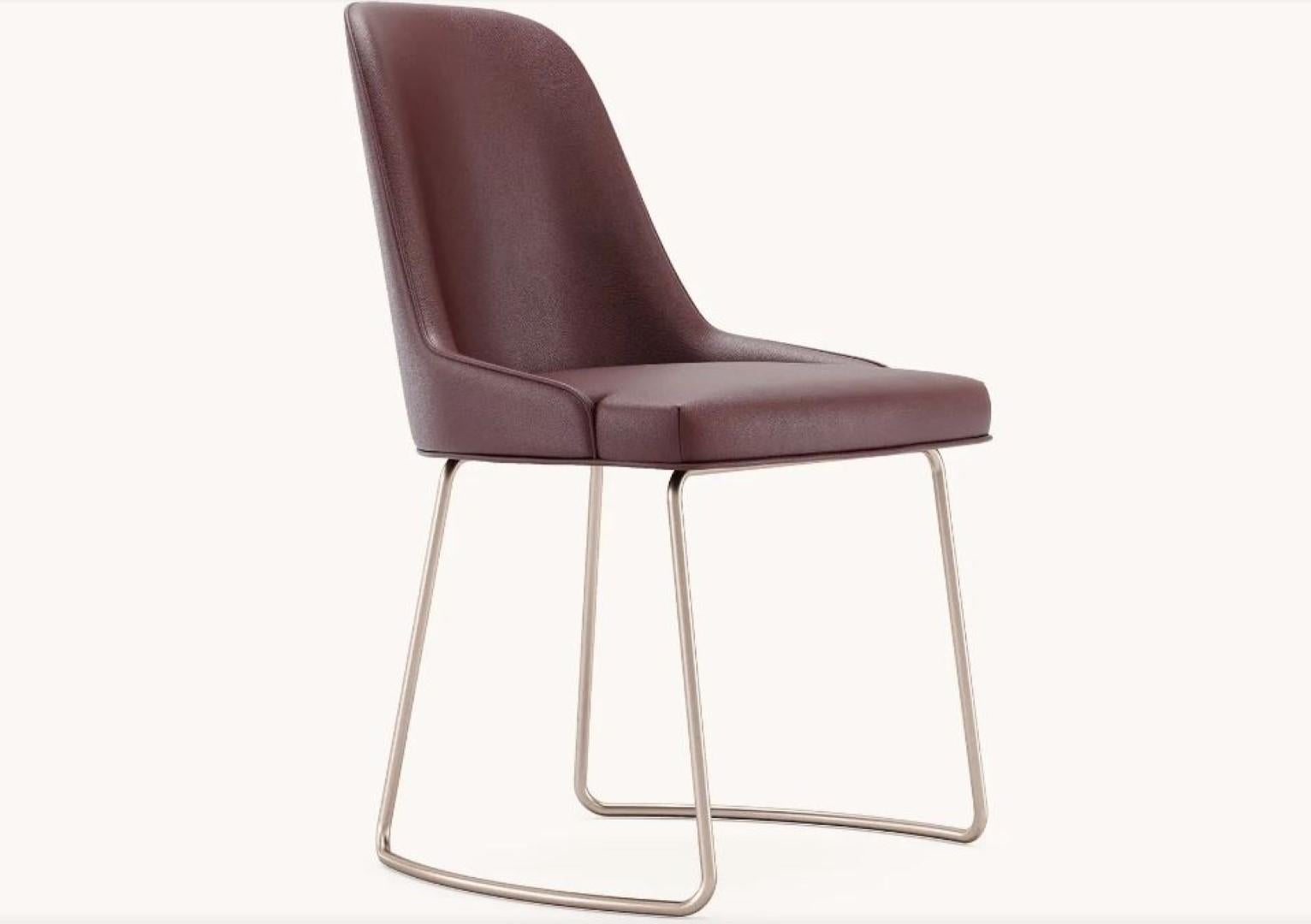 Anna chair with metal baseboard by Domkapa
Materials: Rose Gold Brushed metal, Natural Leather.
Dimensions: W 56 x D 57 x H 86 cm. 
Also available in different materials. 

This timeless chair design is the result of a mature awareness process