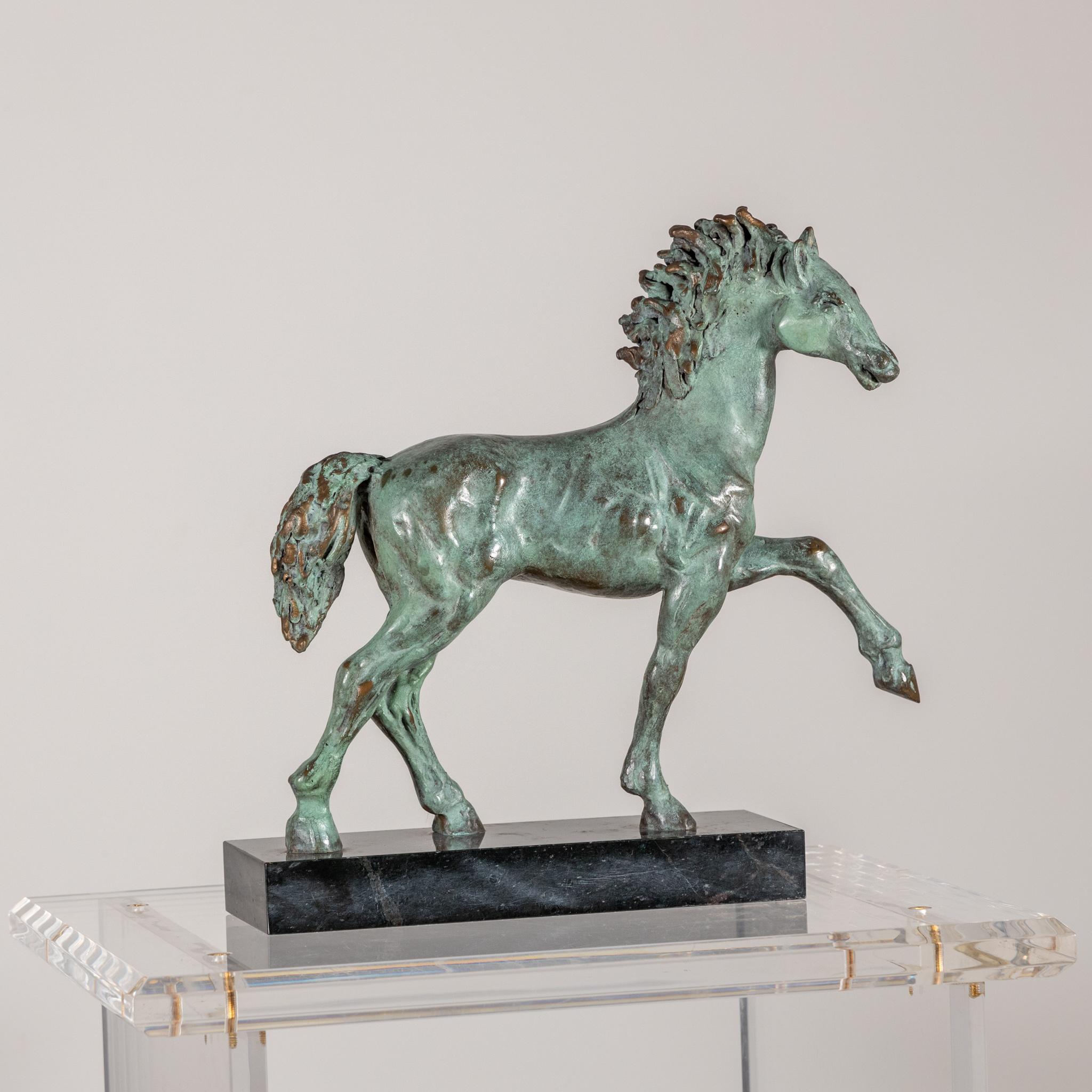 Striding horse in patinated bronze on rectangular black stone base. Stamped 