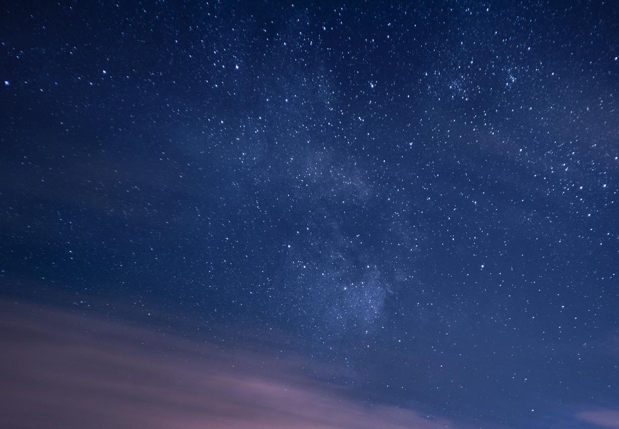 Color night photo of Milky Way  (pink, blue, green). Black wooden frame, glass - Photograph by Anna Dobrovolskaya-Mints