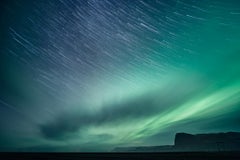 Green photograph of Northern Lights by Anna Dobrovolskaya-Mints