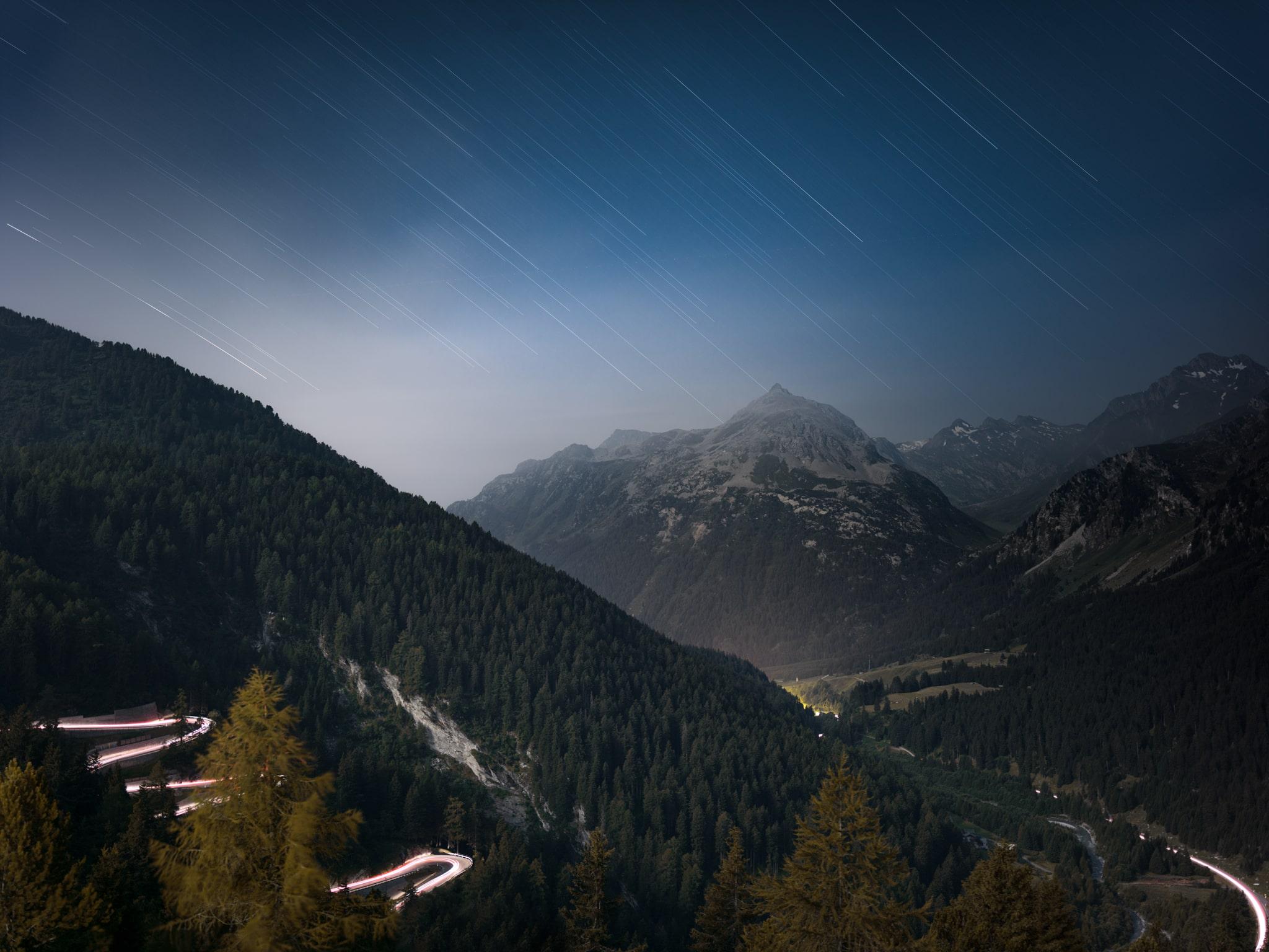 Anna Dobrovolskaya-Mints Color Photograph - Maloja Pass in Switzerland. Night photo, star trails and Swiss Alps