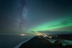Starry sky and Northern Lights in Iceland. Green color, small framed photo