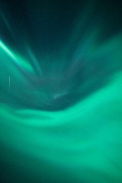 Meteor and Northern Lights photo by Anna Dobrovolskaya-Mints. Green photograph