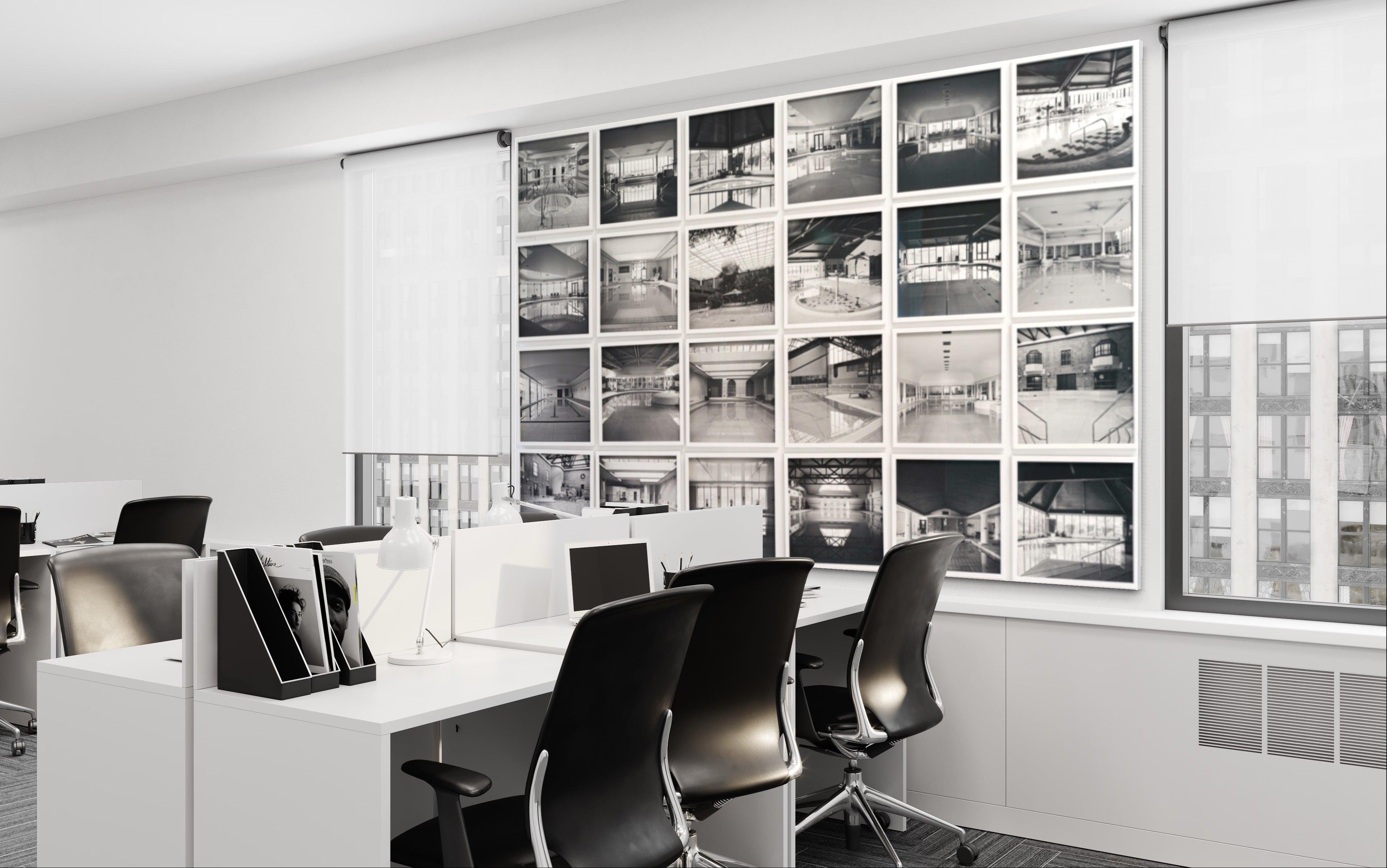 Large panel of black and white architecture photos in white frames with glass - Gray Black and White Photograph by Anna Dobrovolskaya-Mints
