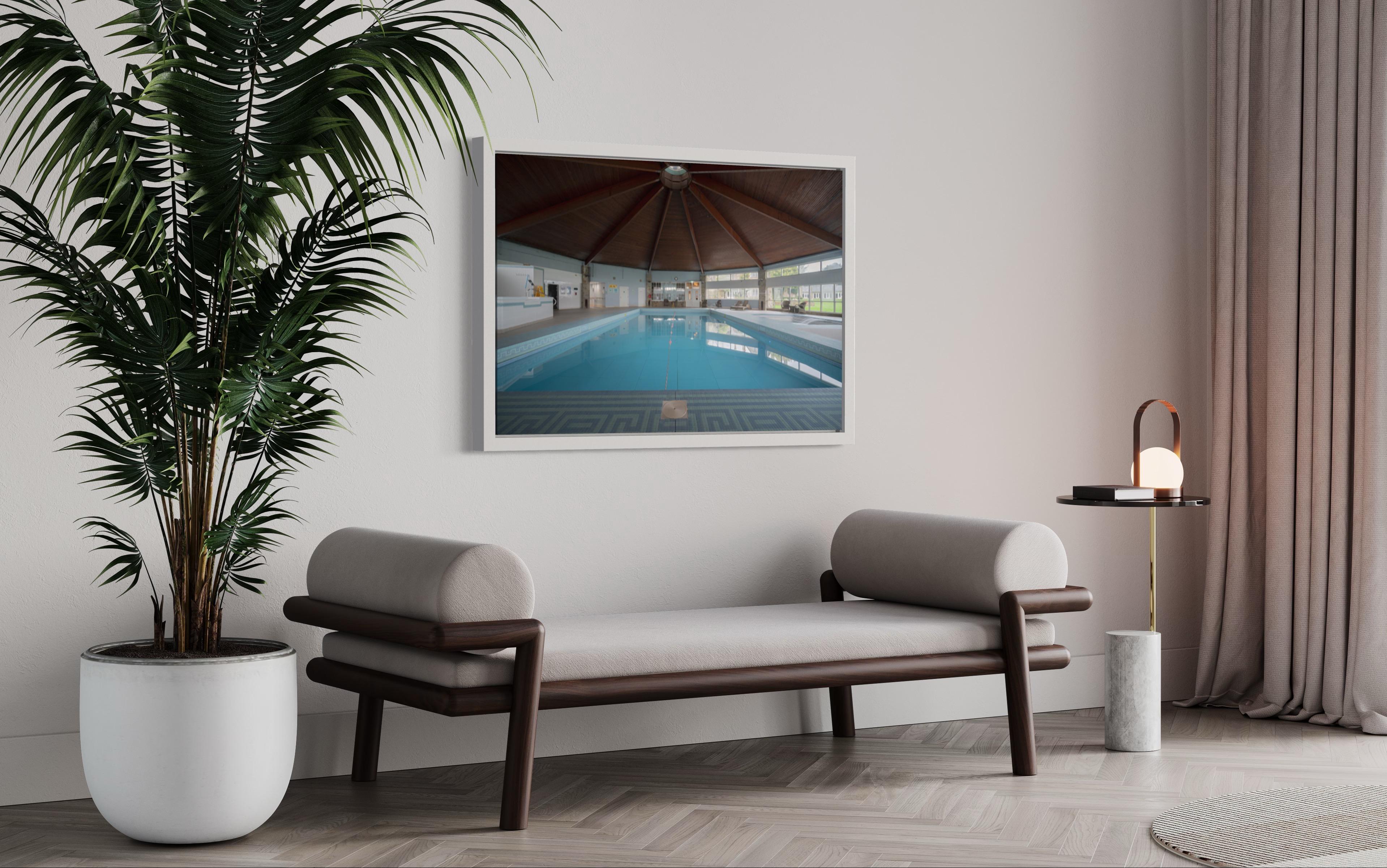 Architectural photo of a pool in a hotel in Wales. White frame, museum glass - Conceptual Photograph by Anna Dobrovolskaya-Mints