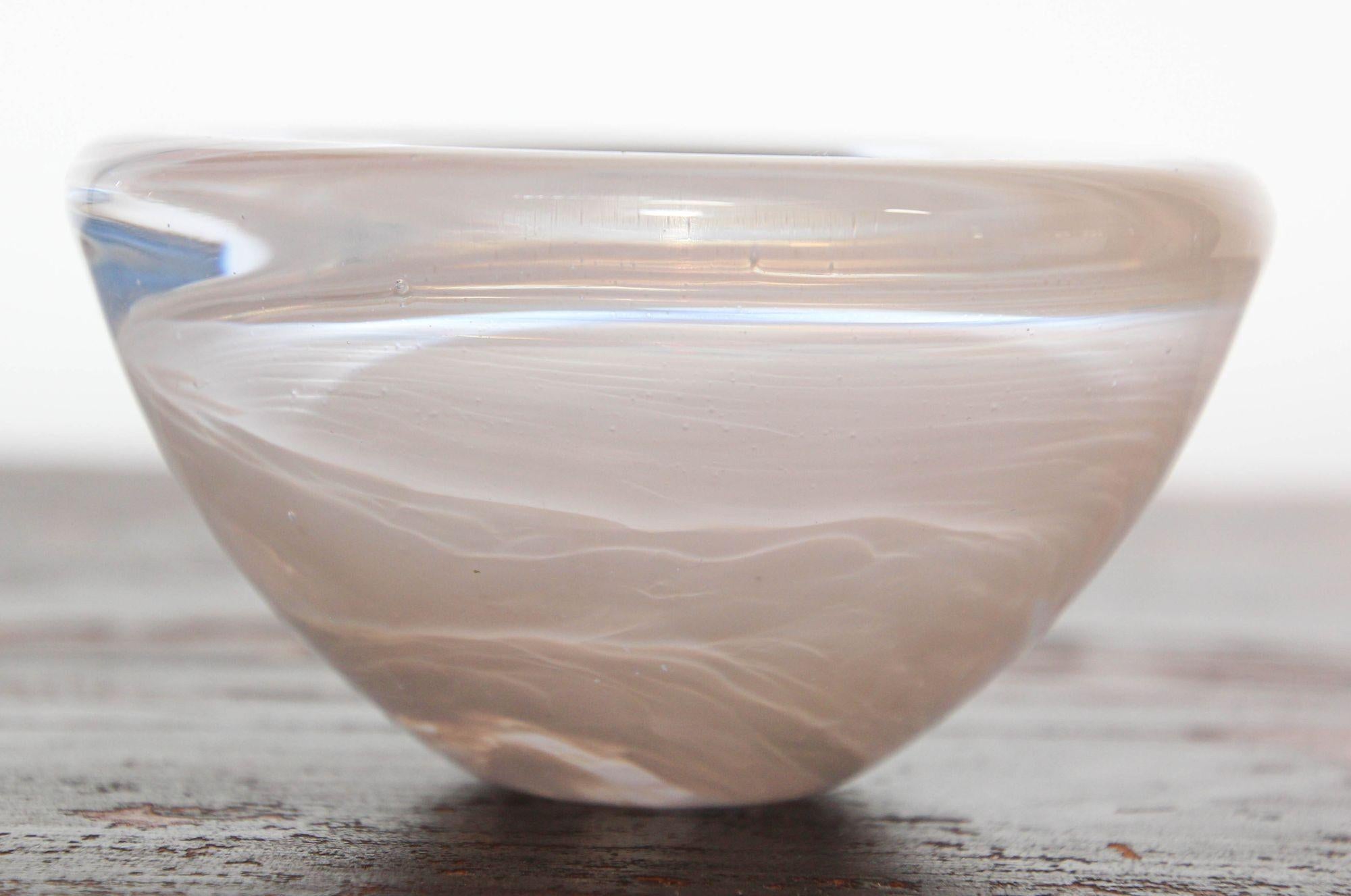 Anna Ehrner for Kosta Boda white crystal paperweight or votive candle holder.
Kosta Boda white crystal candle holder by Anna Ehrner, 1990s
A Kosta Boda votive holder or paperweight by Anna Ehrner made from 1981 to 1990 in Kosta, Sweden.
The bowl