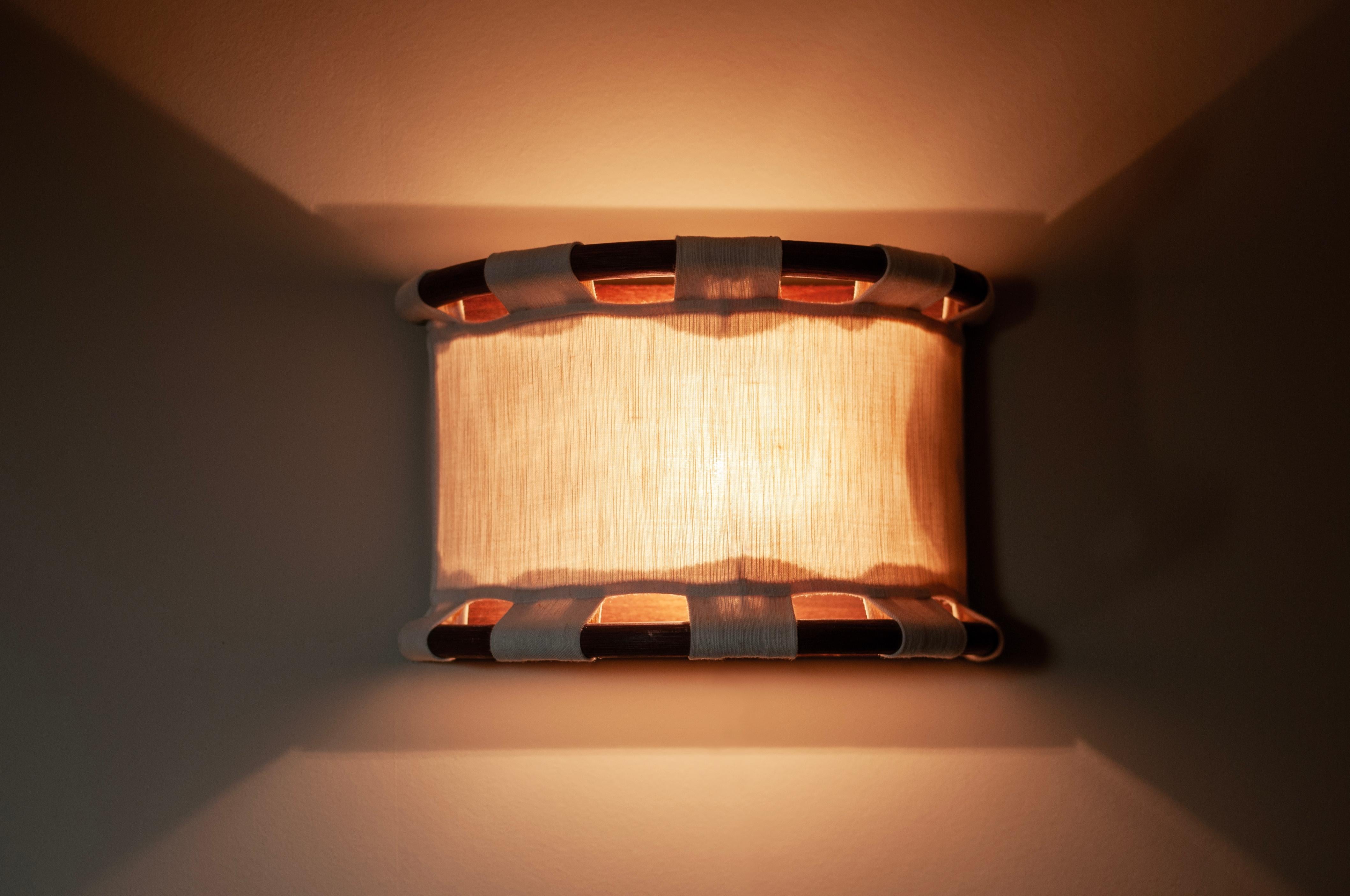 Anna Ehrner's 1970s Mid-Century Modern Linen and Bamboo Wall Lamp (Model 4016) In Good Condition For Sale In Søgne, NO