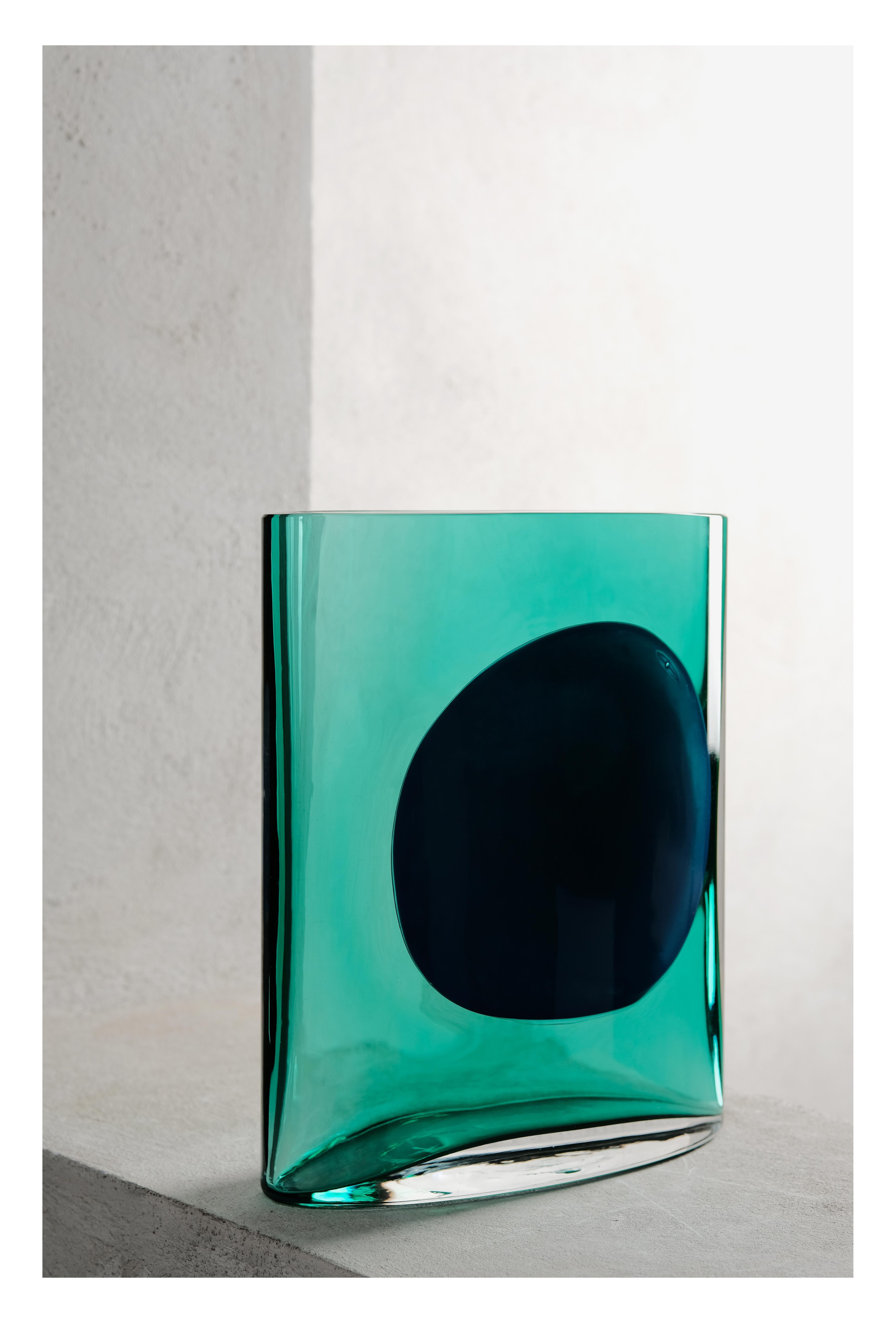 The result of a year-long collaboration between the Swiss-French designer and Nouvel Studio, Isla explores the juxtaposition of myriad hues and glass transparencies through two different vase sizes. The simplicity of the design accentuates the